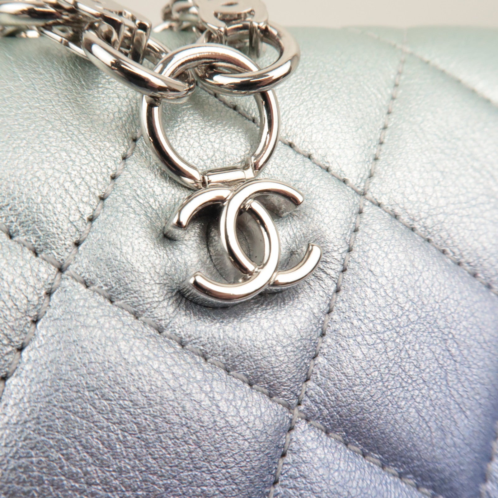 CHANEL Lambskin Mini Matelasse Wristlet Clutch Metalic Ombre HA6PKPX6