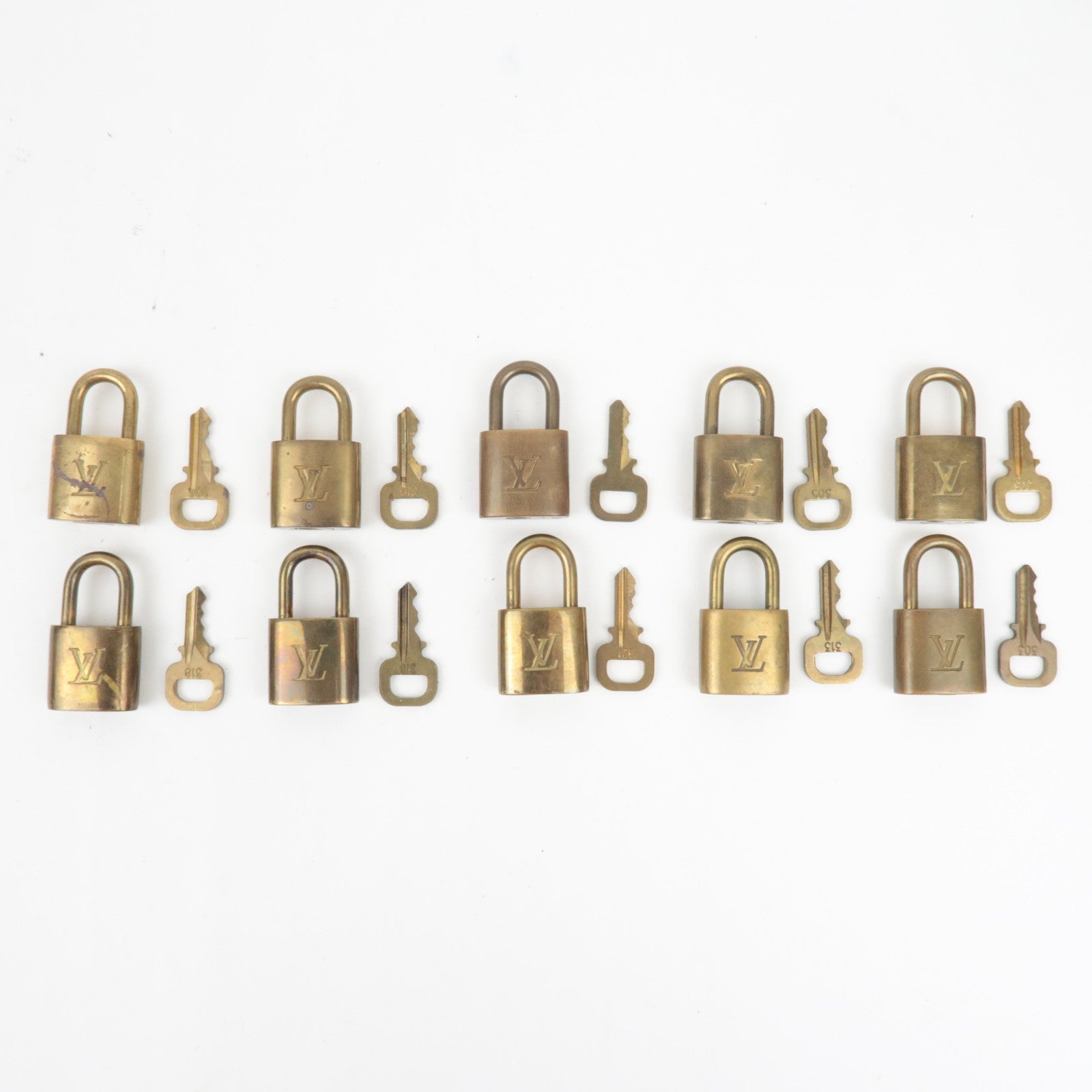 Louis Vuitton Set of 10 Key Locks Cadena Set Metal Gold Color