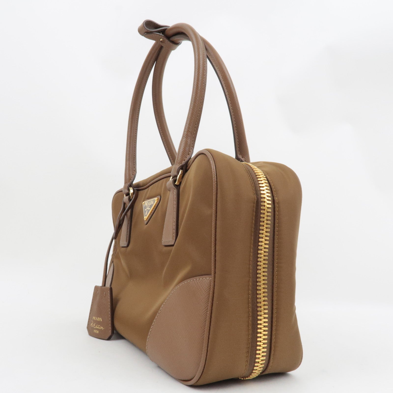 PRADA Re-Edition 1978 Medium 2Way Handbag Leather Beige 1BB115 *Strap, Clochette, Poignet