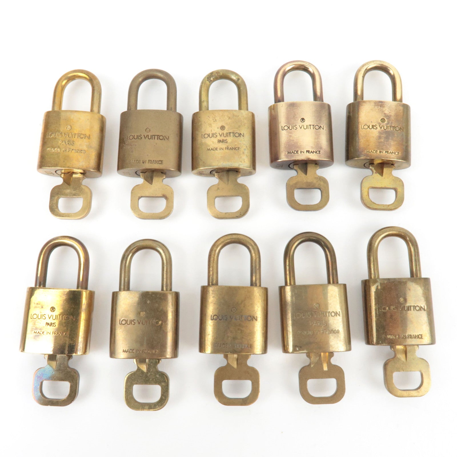 Louis Vuitton Set of 10 Key Locks Cadena Set Metal Gold Color