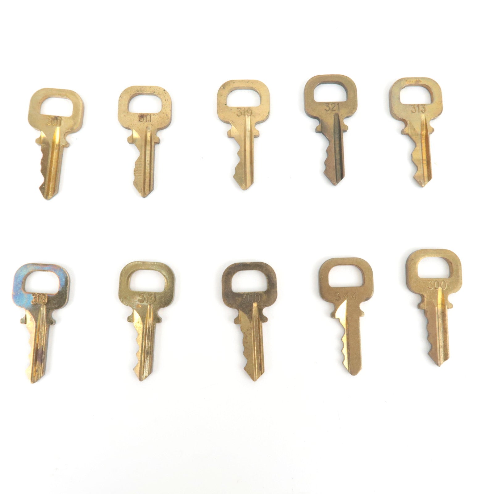 Louis Vuitton Set of 10 Key Locks Cadena Set Metal Gold Color