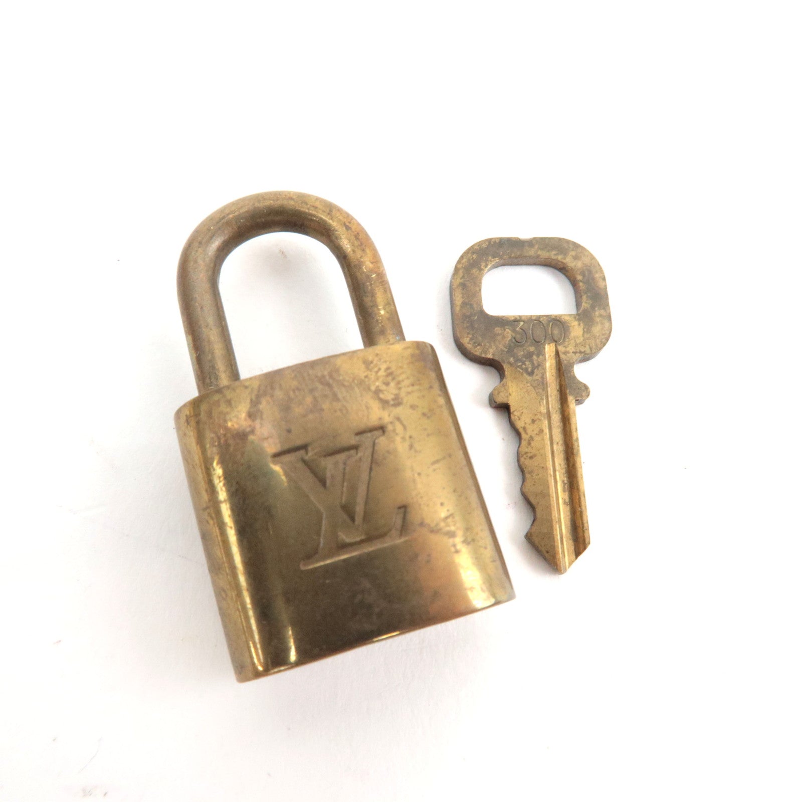 Louis Vuitton Set of 10 Key Locks Cadena Set Metal Gold Color