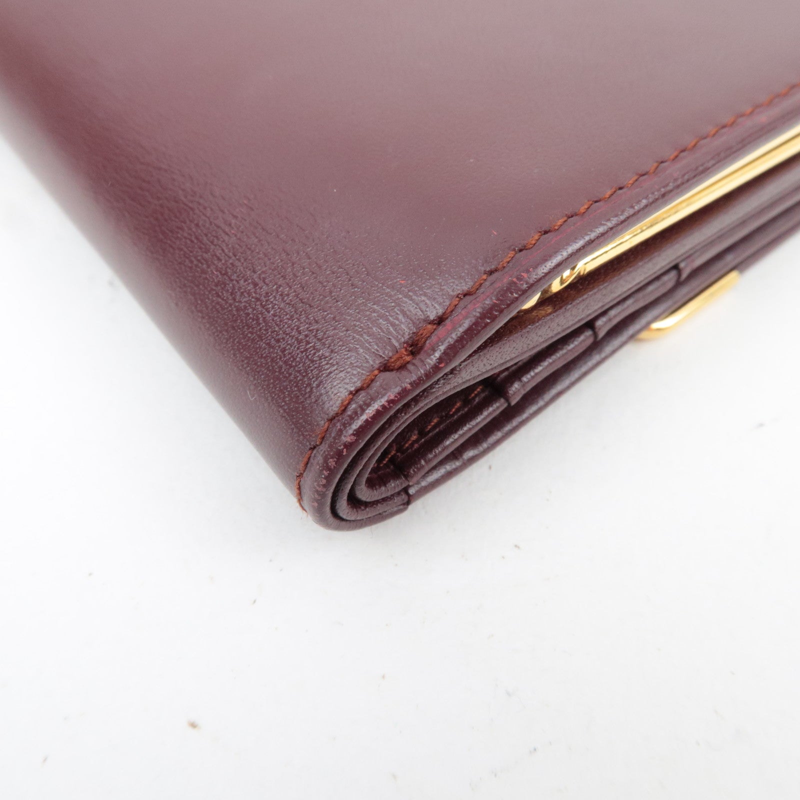 Cartier Must Line Kiss Lock Tri-Fold Wallet Leather Bordeaux *Box