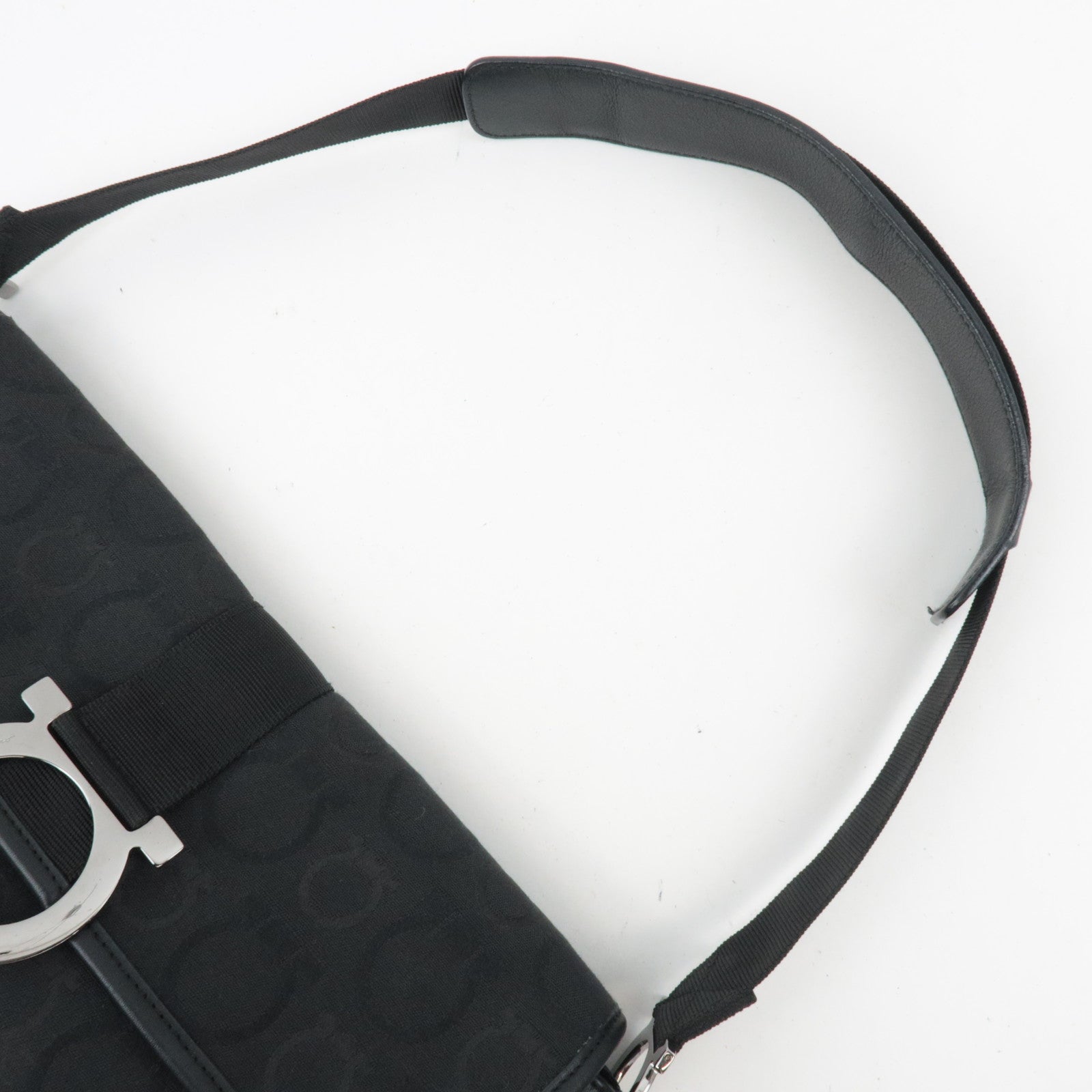 Ferragamo Gancini Shoulder Bag Canvas Leather Black close-up of strap and logo detail.