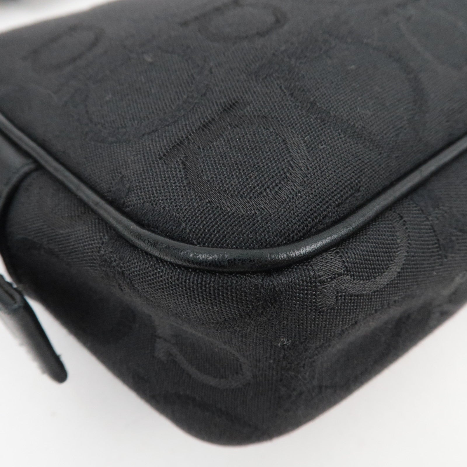 Ferragamo Gancini Shoulder Bag Canvas Leather Black close-up view showing texture and detail of the material.