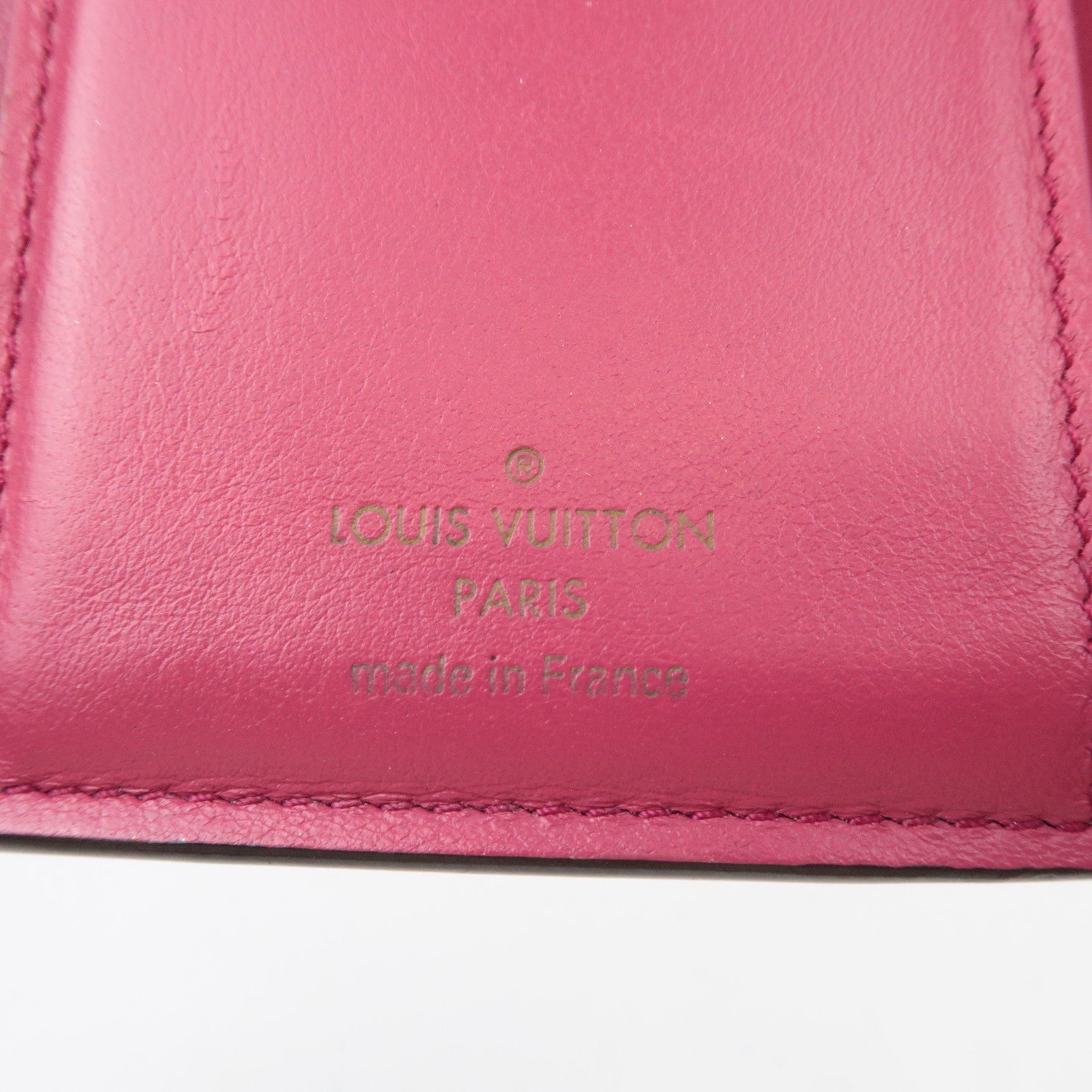Louis Vuitton Portefeuille Capucines Compact Trifold Wallet Taurillon Leather Noir Hot Pink M62157