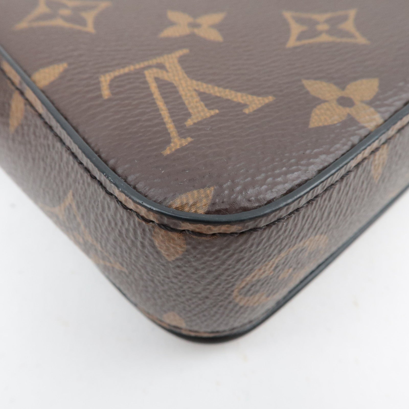 Louis Vuitton Monogram Macassar S Lock Vertical Wearable Wallet M81522