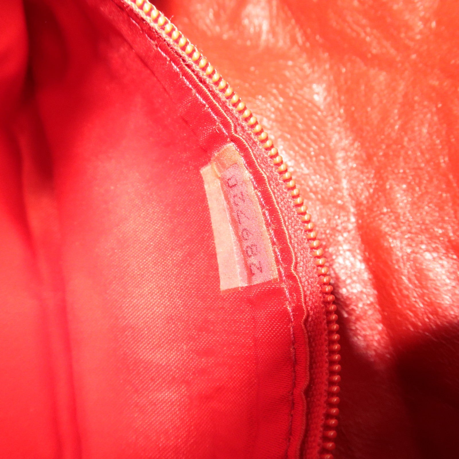 CHANEL Matelasse Lambskin Tassel Small Pouch Red Gold HDW 289720