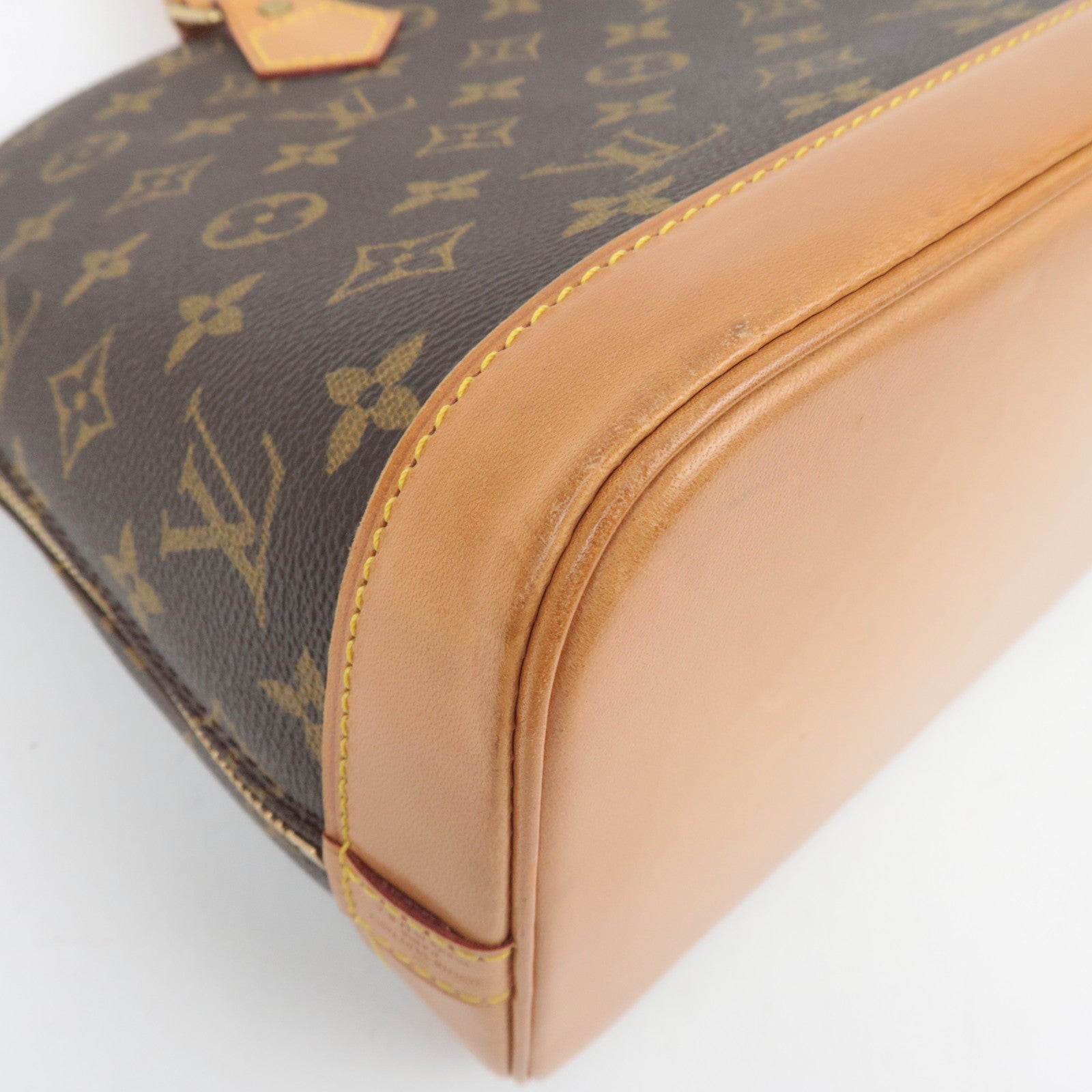 Louis Vuitton Monogram Alma Handbag M51130