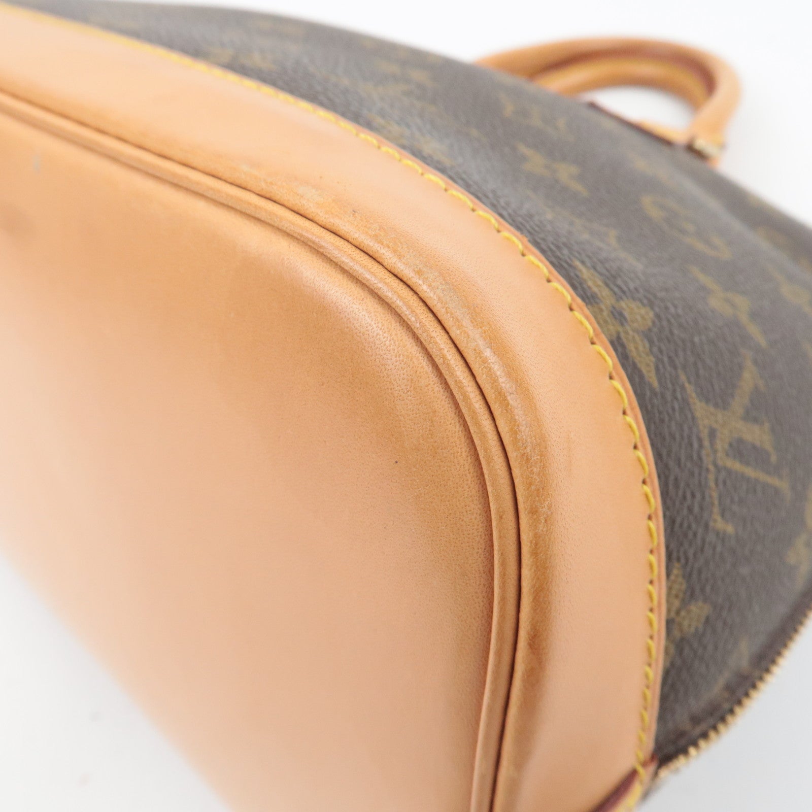 Louis Vuitton Monogram Alma Handbag M51130