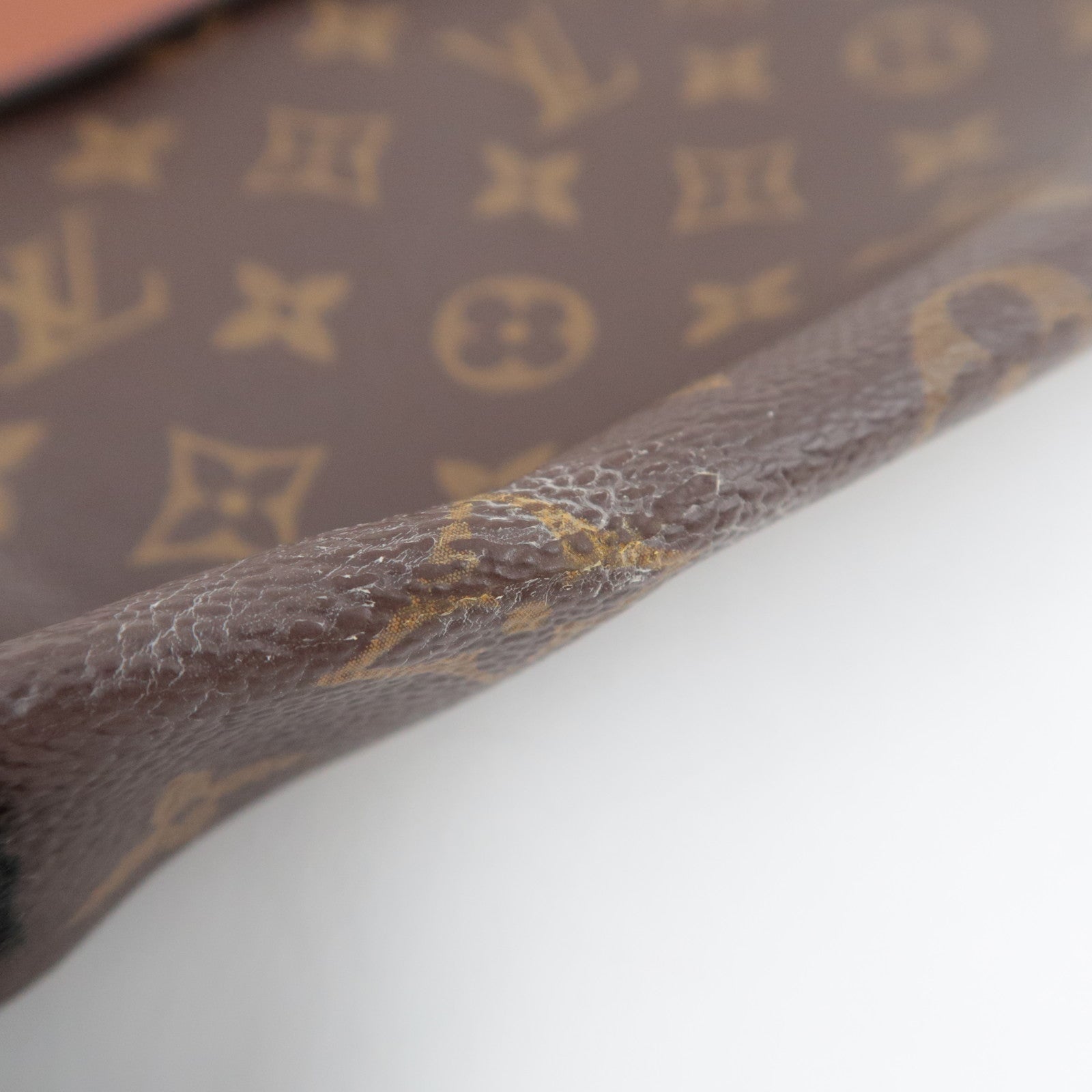 Louis Vuitton Monogram Pochette Tuileries Clutch Bag M64035