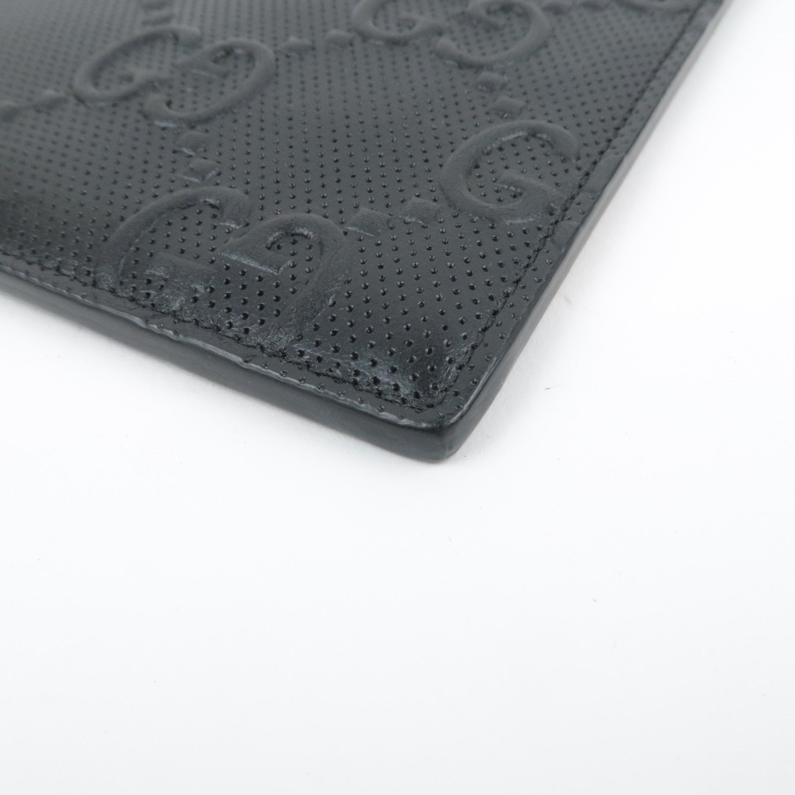 GUCCI GG Embossed Leather Clutch Bag Black 625569