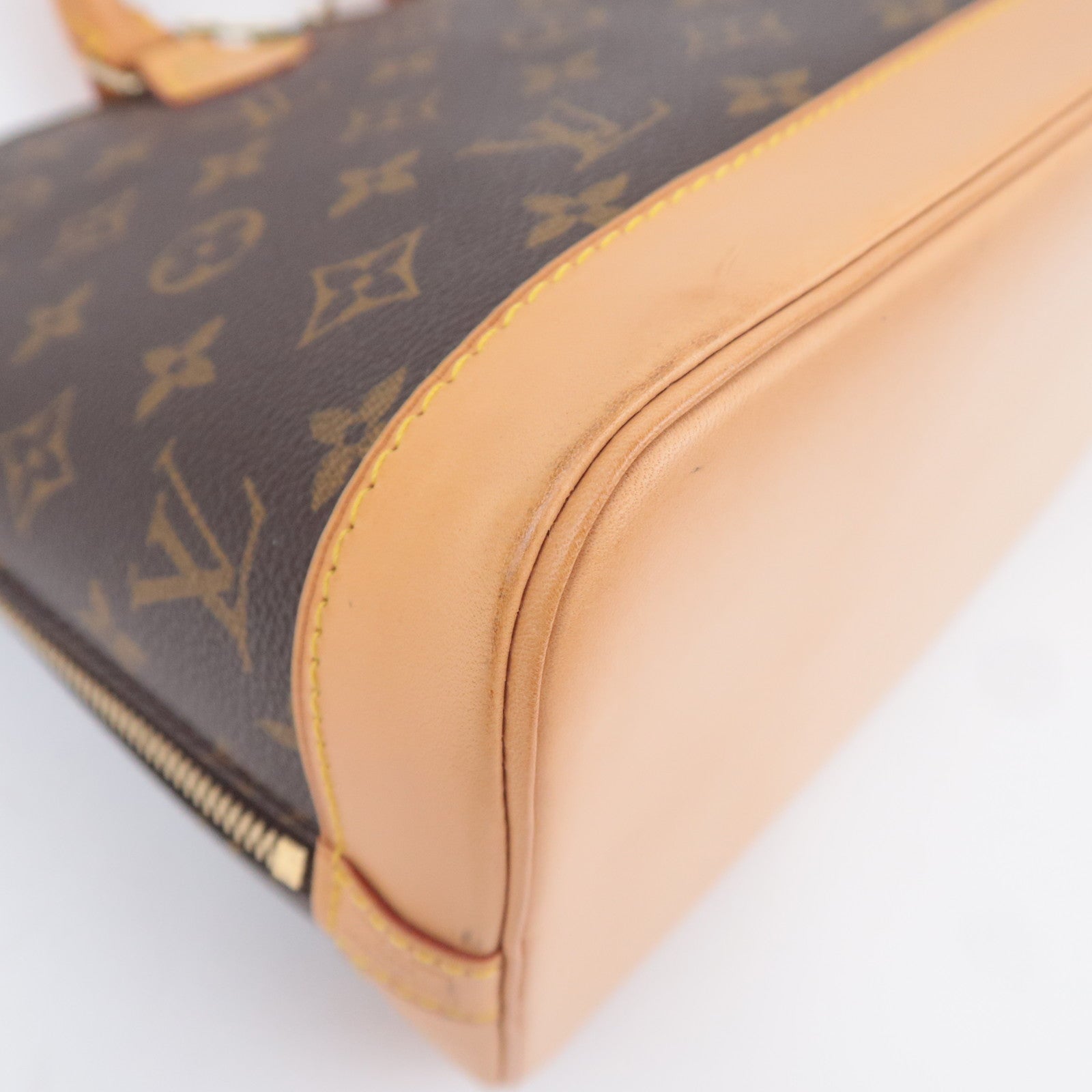 Louis Vuitton Monogram Alma Handbag M51130