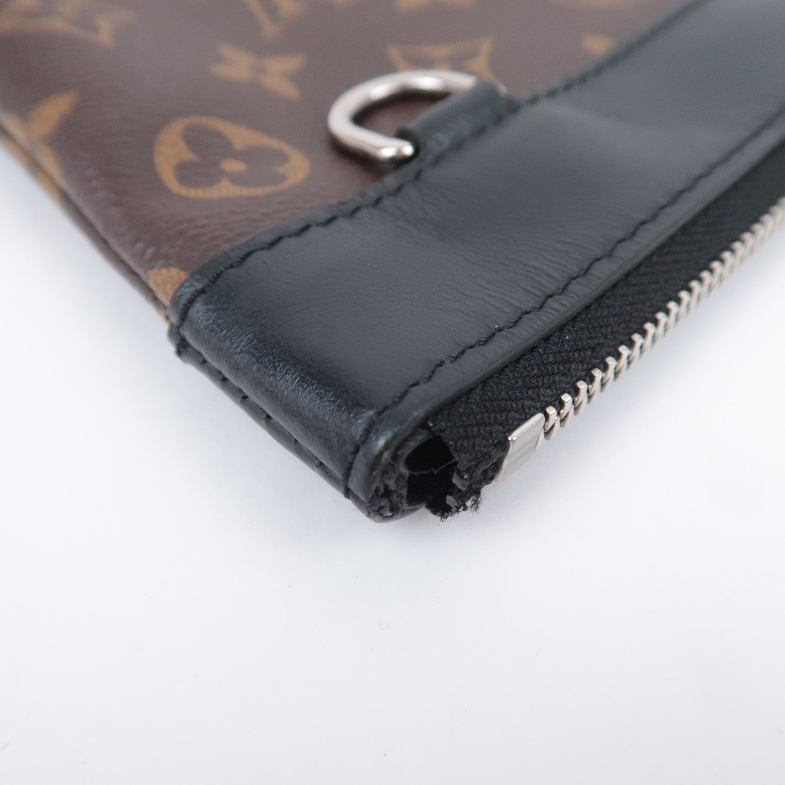 Louis Vuitton Monogram Macassar Pochette Discovery Clutch Bag M69411