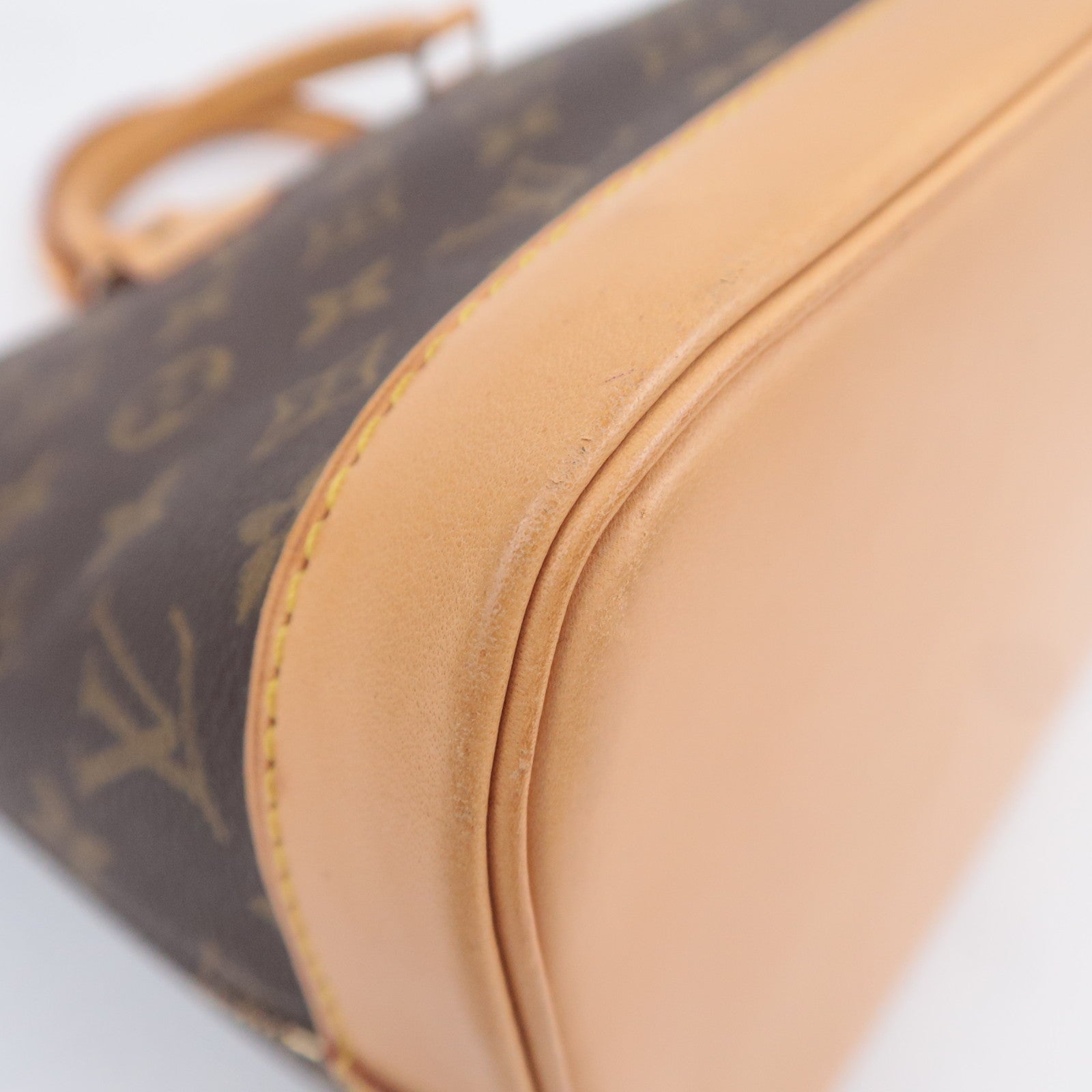 Louis Vuitton Monogram Alma Handbag M51130
