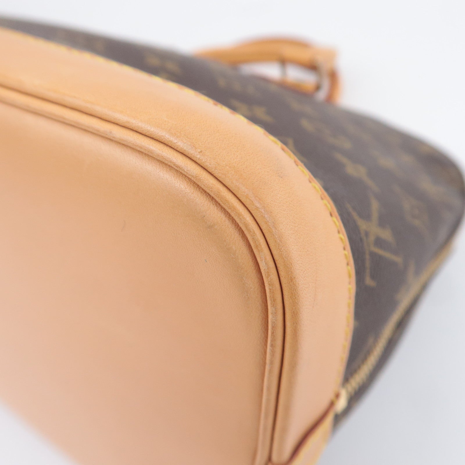 Louis Vuitton Monogram Alma Handbag M51130