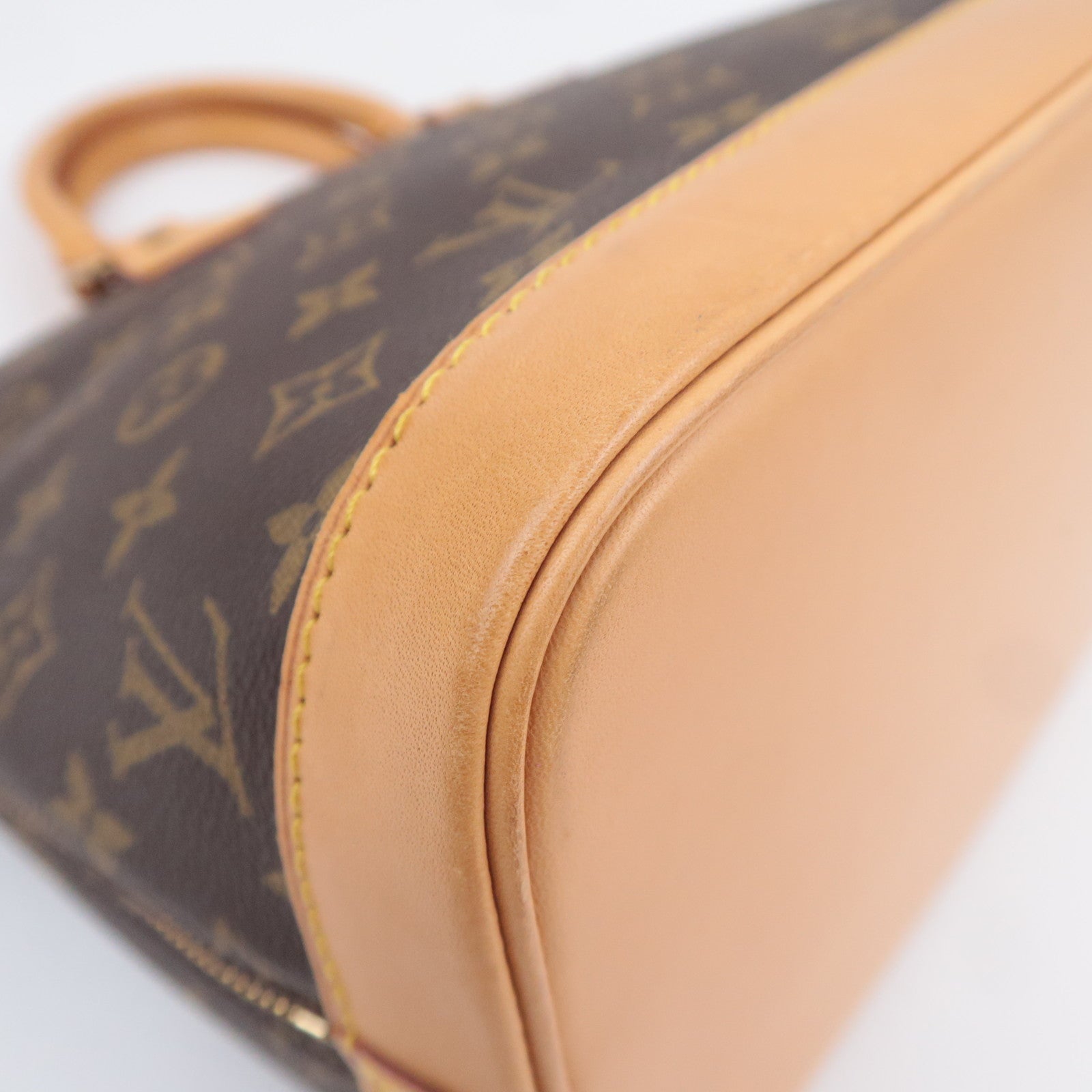 Louis Vuitton Monogram Alma Handbag M51130