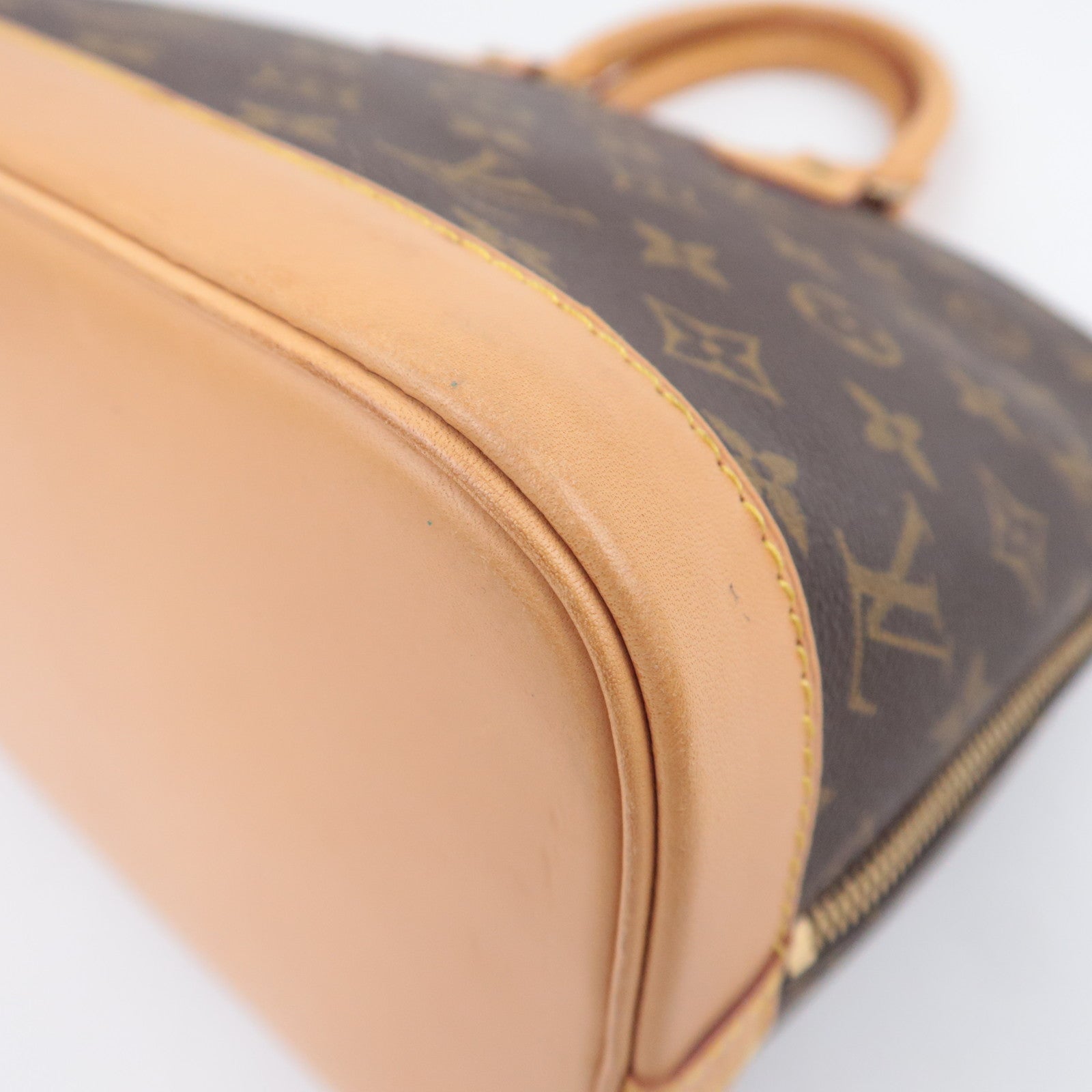 Louis Vuitton Monogram Alma Handbag M51130