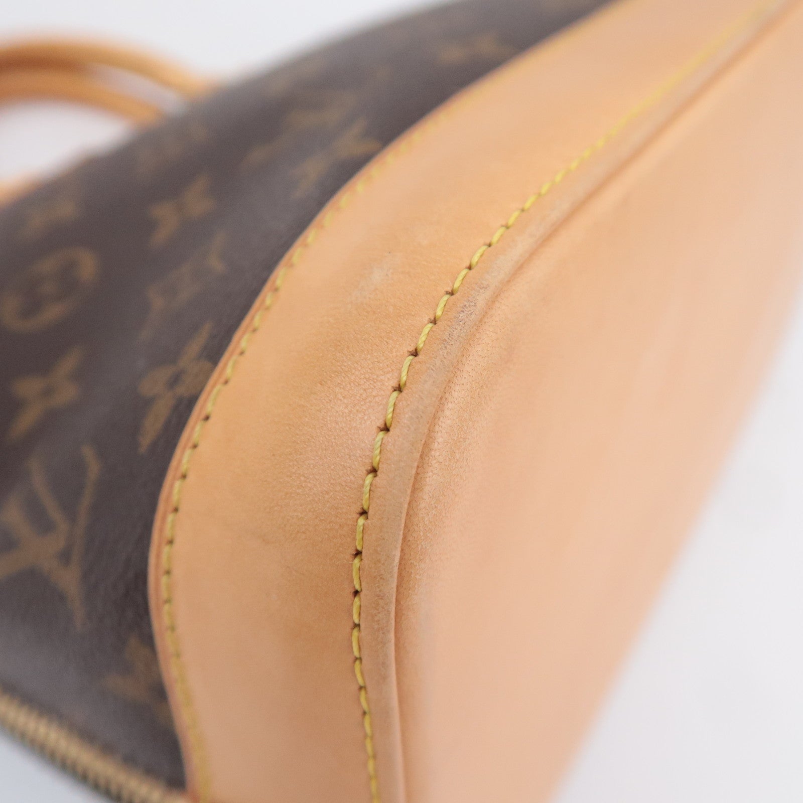 Louis Vuitton Monogram Alma Handbag M51130