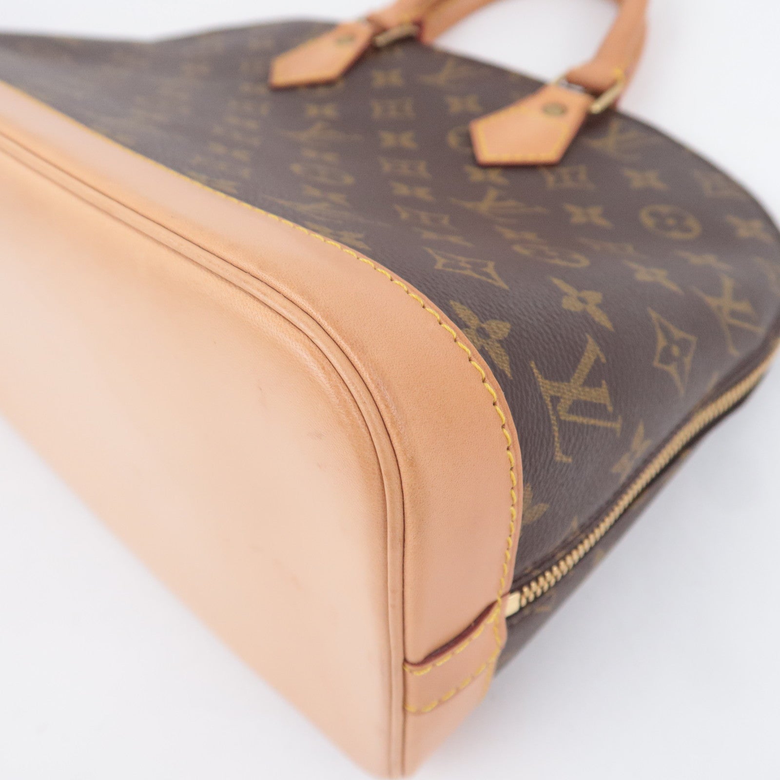 Louis Vuitton Monogram Alma Handbag M51130