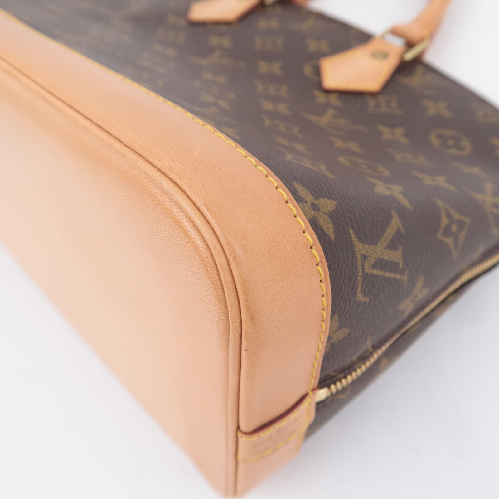 Louis Vuitton Monogram Alma Handbag M51130