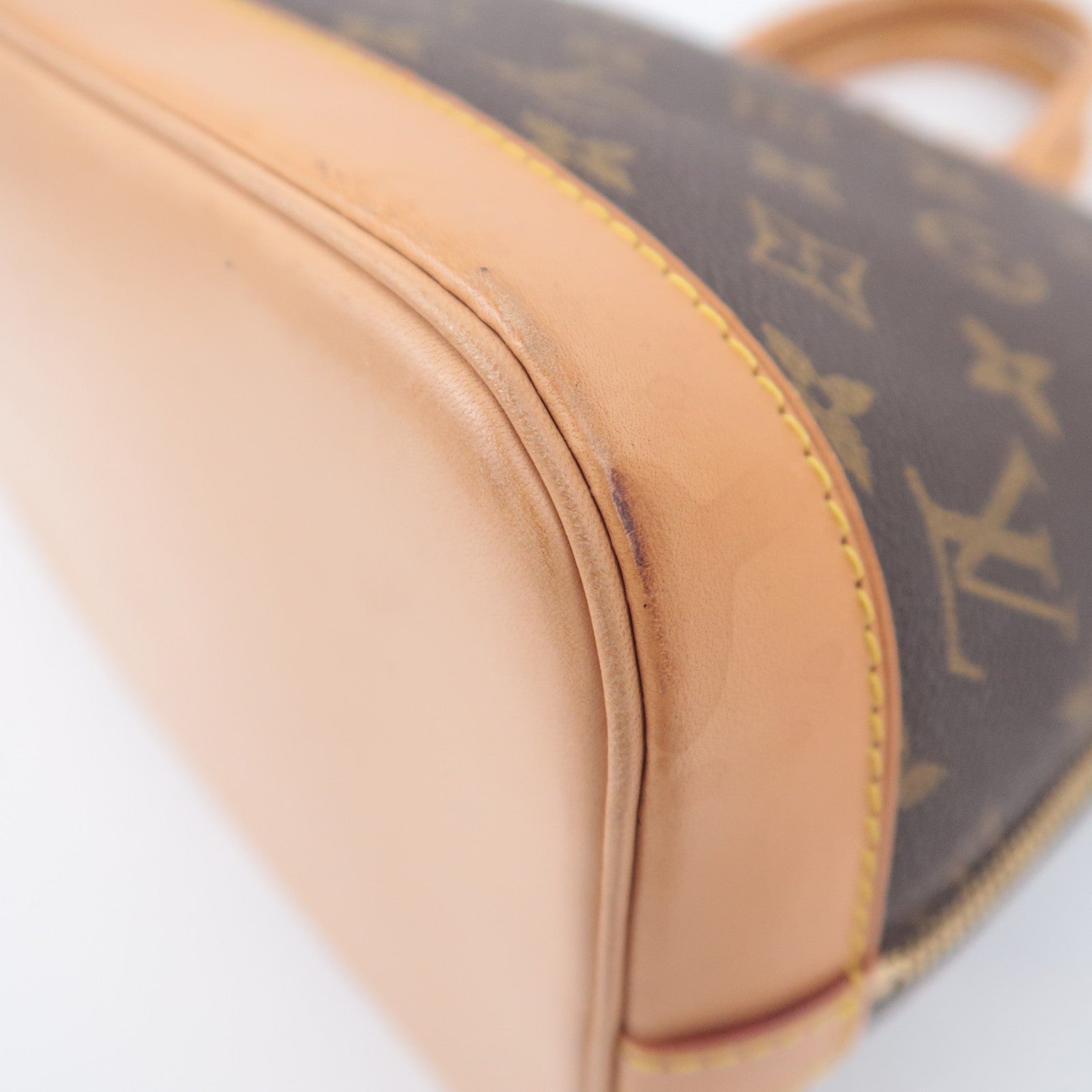 Louis Vuitton Monogram Alma Handbag M51130