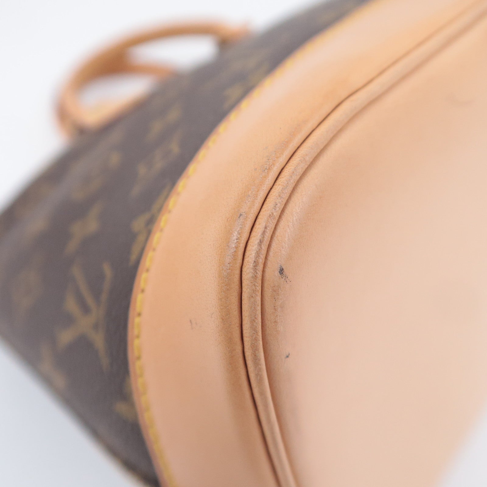 Louis Vuitton Monogram Alma Handbag M51130