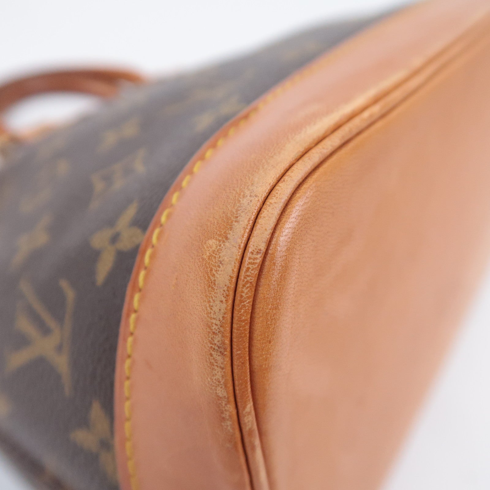 Louis Vuitton Monogram Alma Handbag M51130