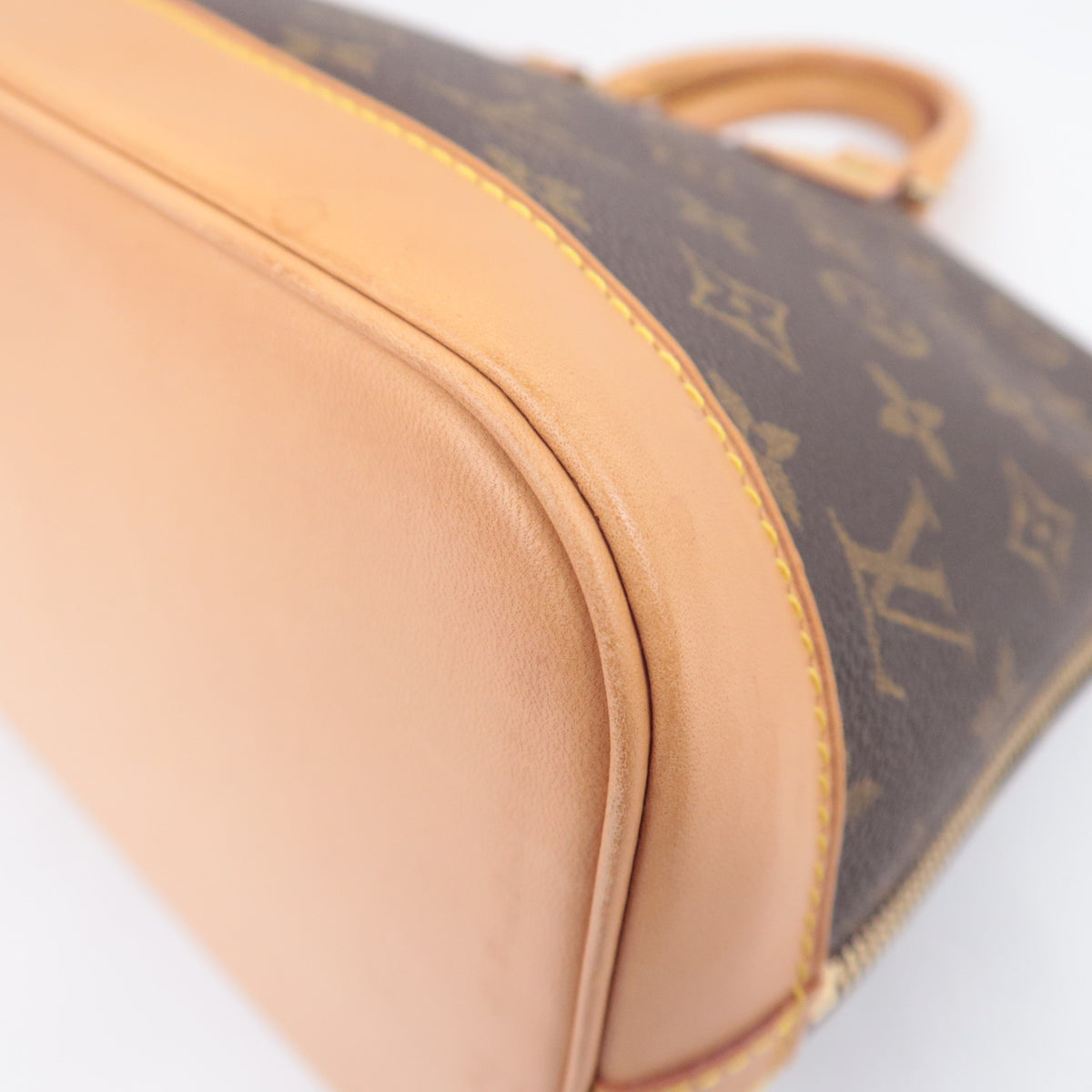 Louis Vuitton Monogram Alma Handbag M51130