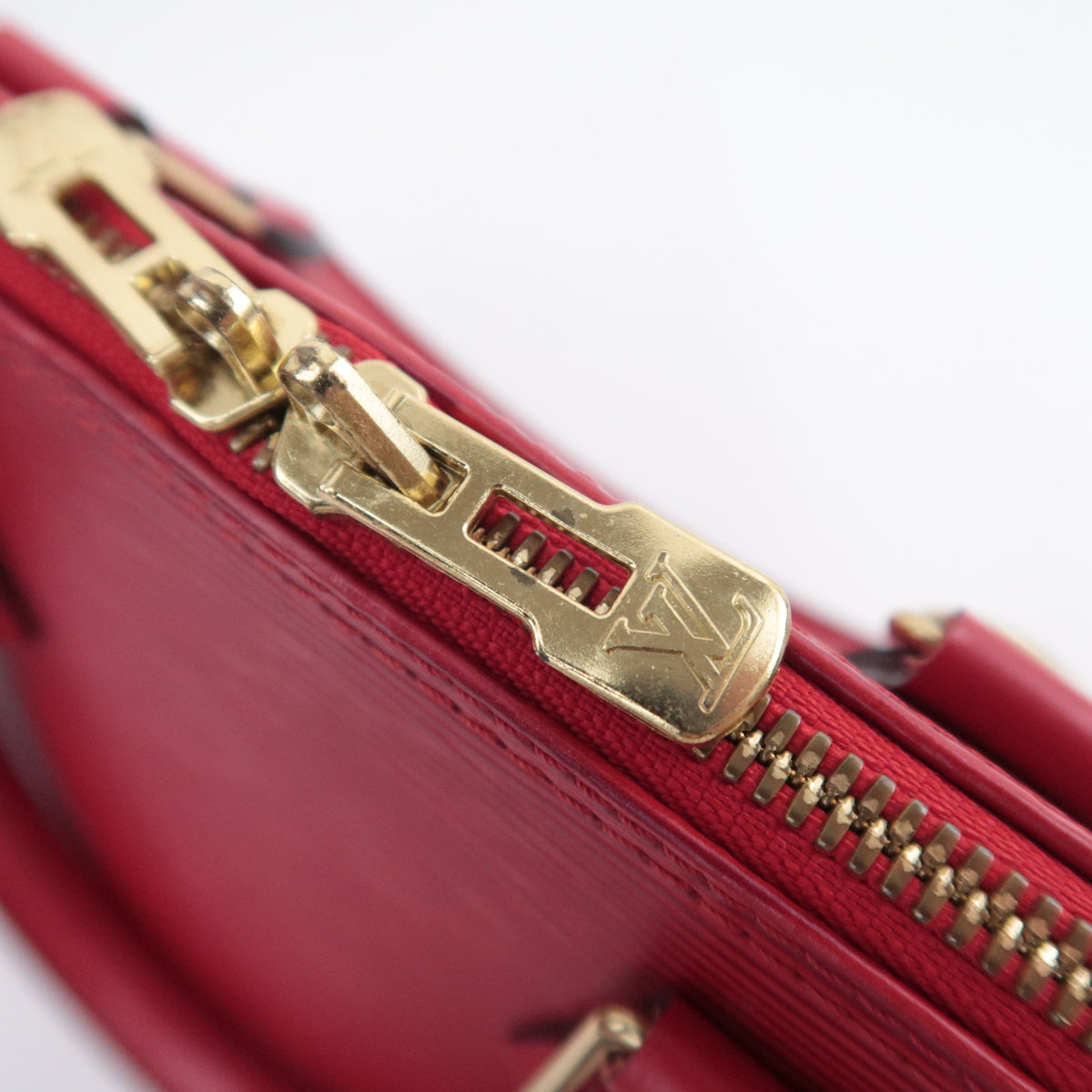Louis Vuitton Epi Alma Handbag M52147