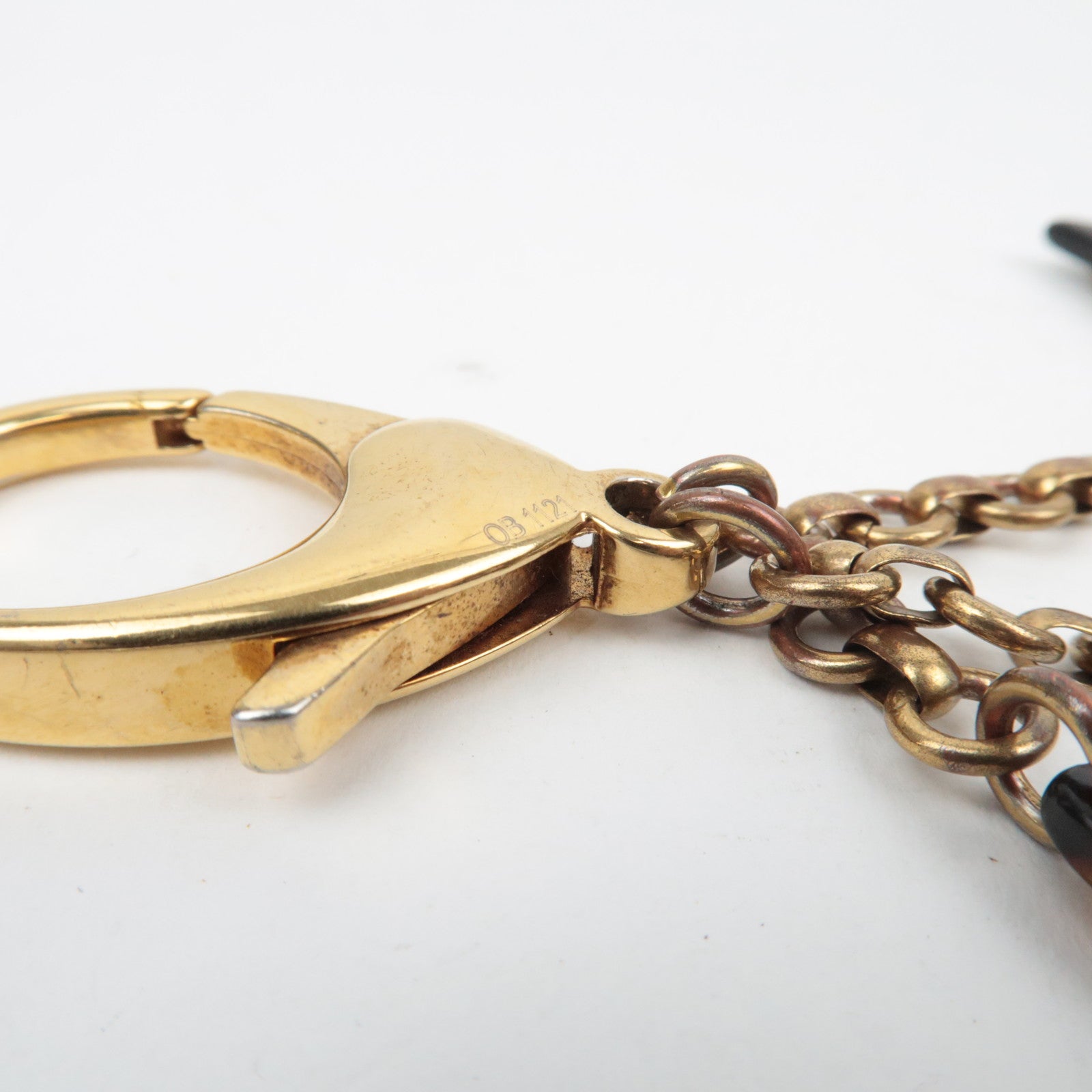 Louis Vuitton Bijou Sac INSOLENCE Charm M65844/OB1121 Goudbruin 