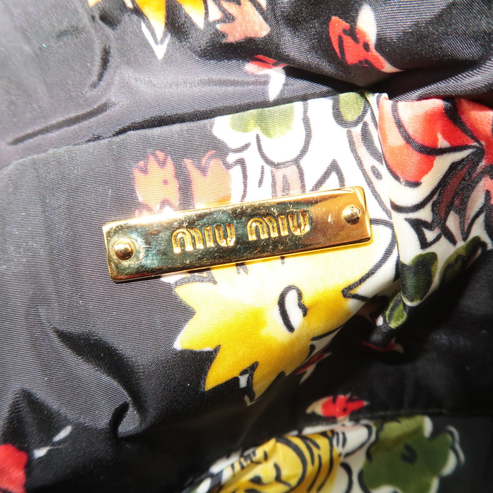 MIU MIU Nylon Bloemenprint Cosmetische Tas Zwart 