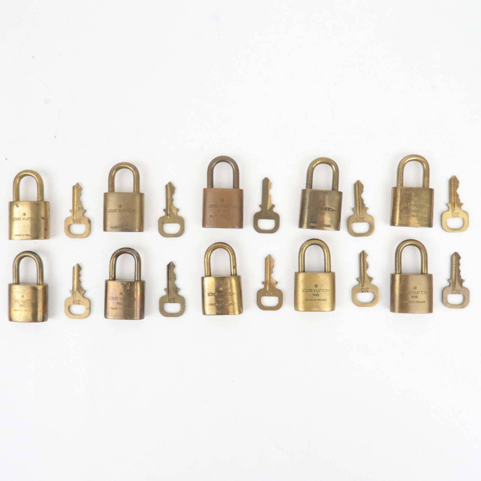 Louis Vuitton Set of 10 Key Locks Cadena Set Metal Gold Color