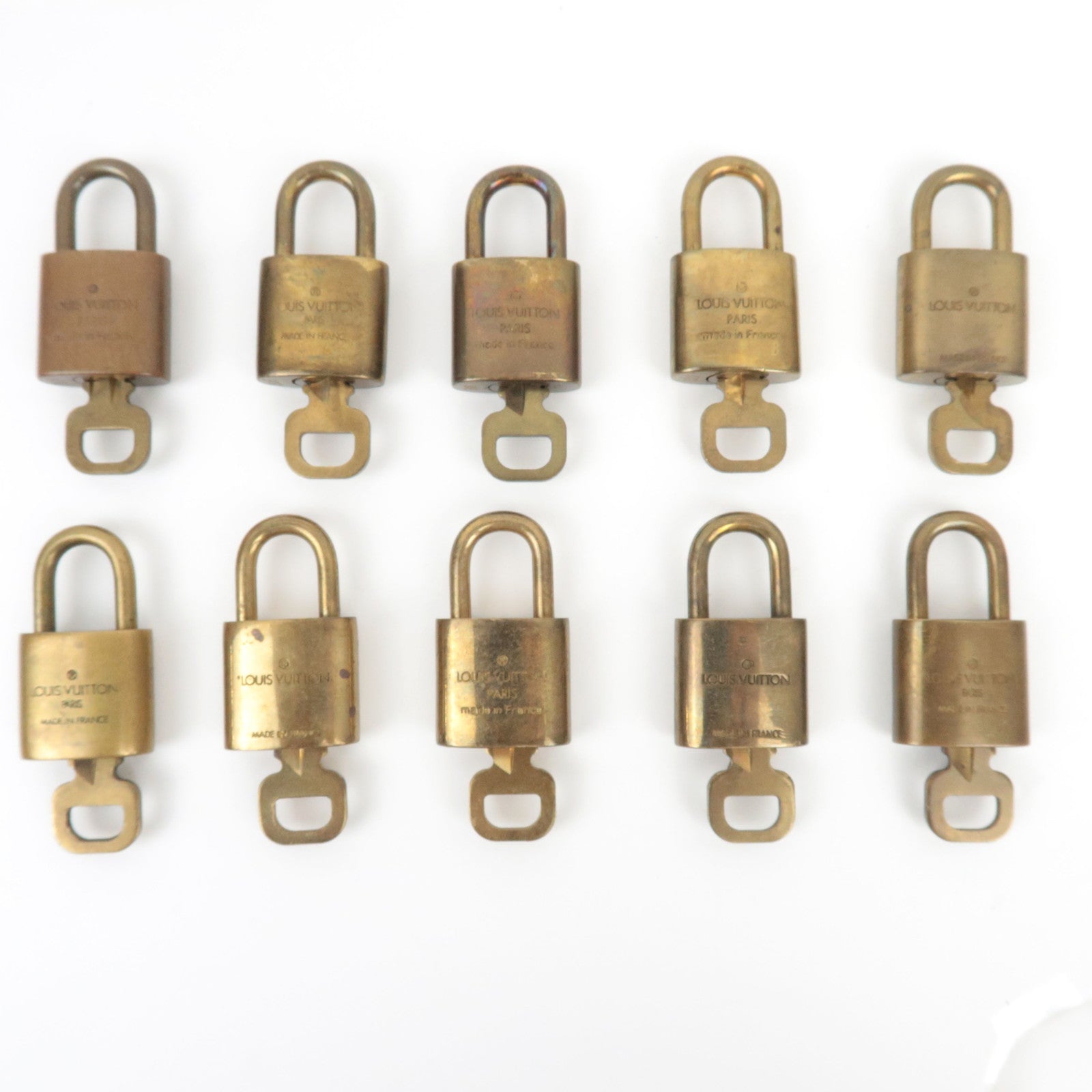 Louis Vuitton Set of 10 Key Locks Cadena Set Metal Gold Color