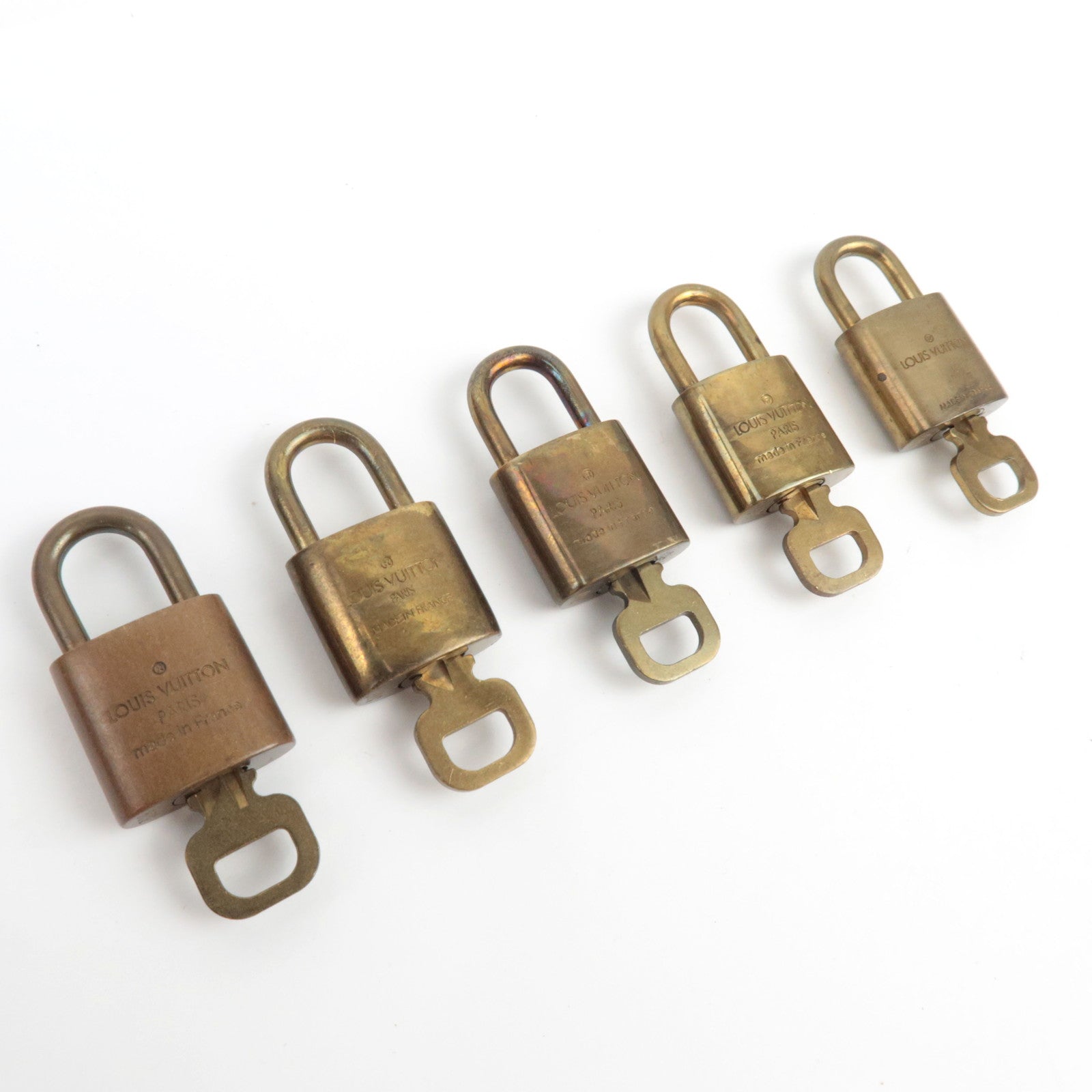 Louis Vuitton Set of 10 Key Locks Cadena Set Metal Gold Color