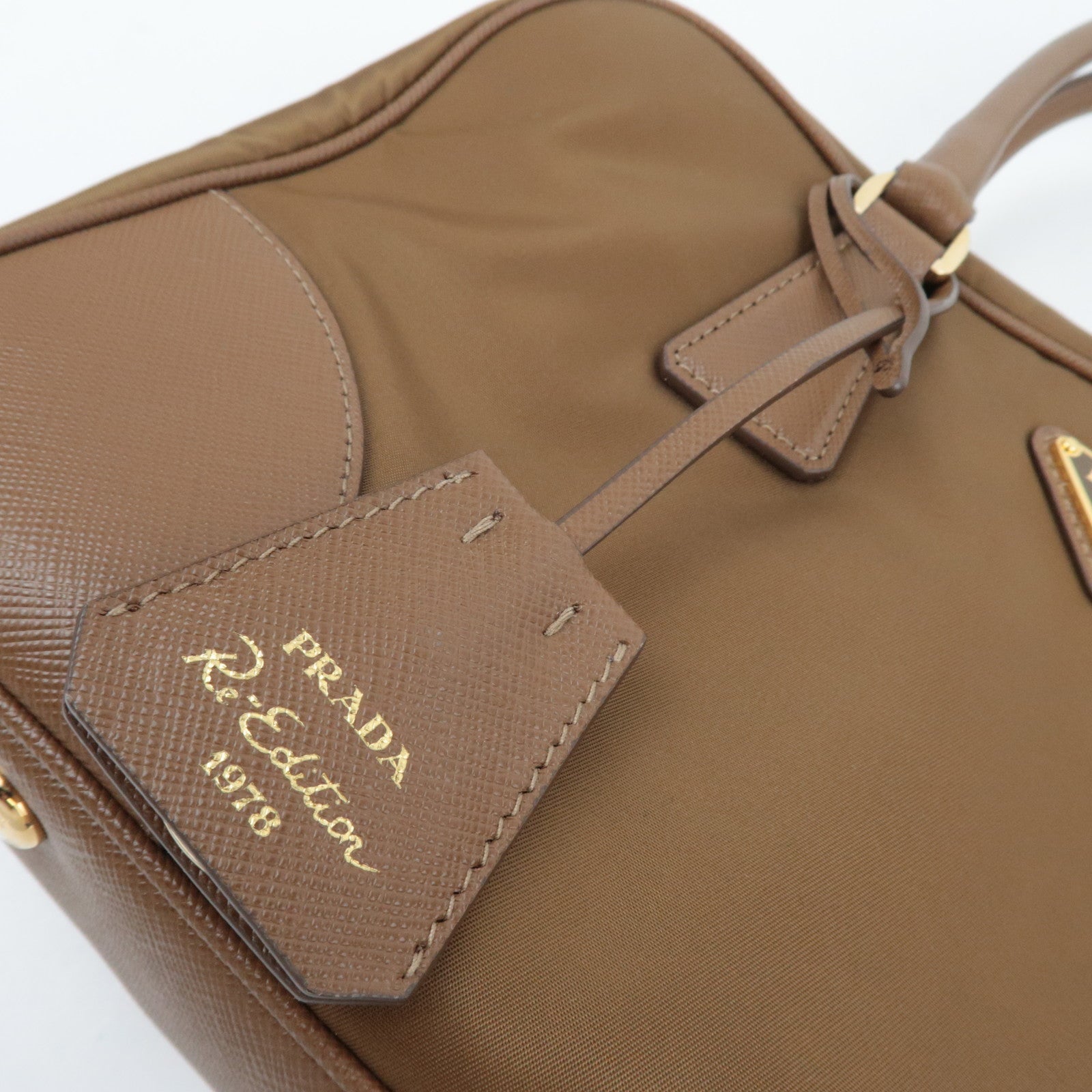 PRADA Re-Edition 1978 Medium 2Way Handbag Leather Beige 1BB115 *Strap, Clochette, Poignet