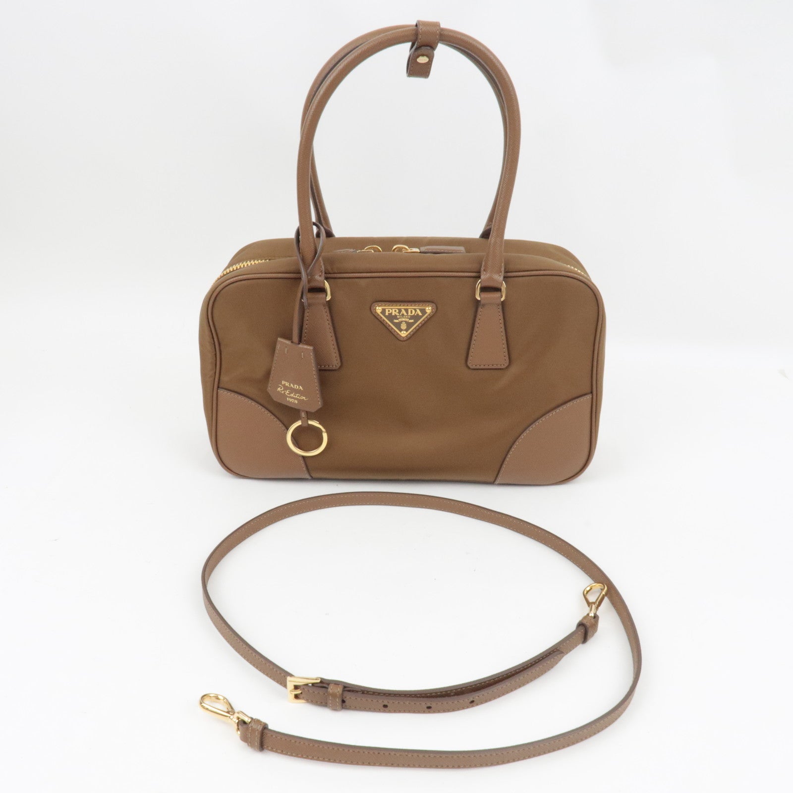 PRADA Re-Edition 1978 Medium 2Way Handbag Leather Beige 1BB115 *Strap, Clochette, Poignet