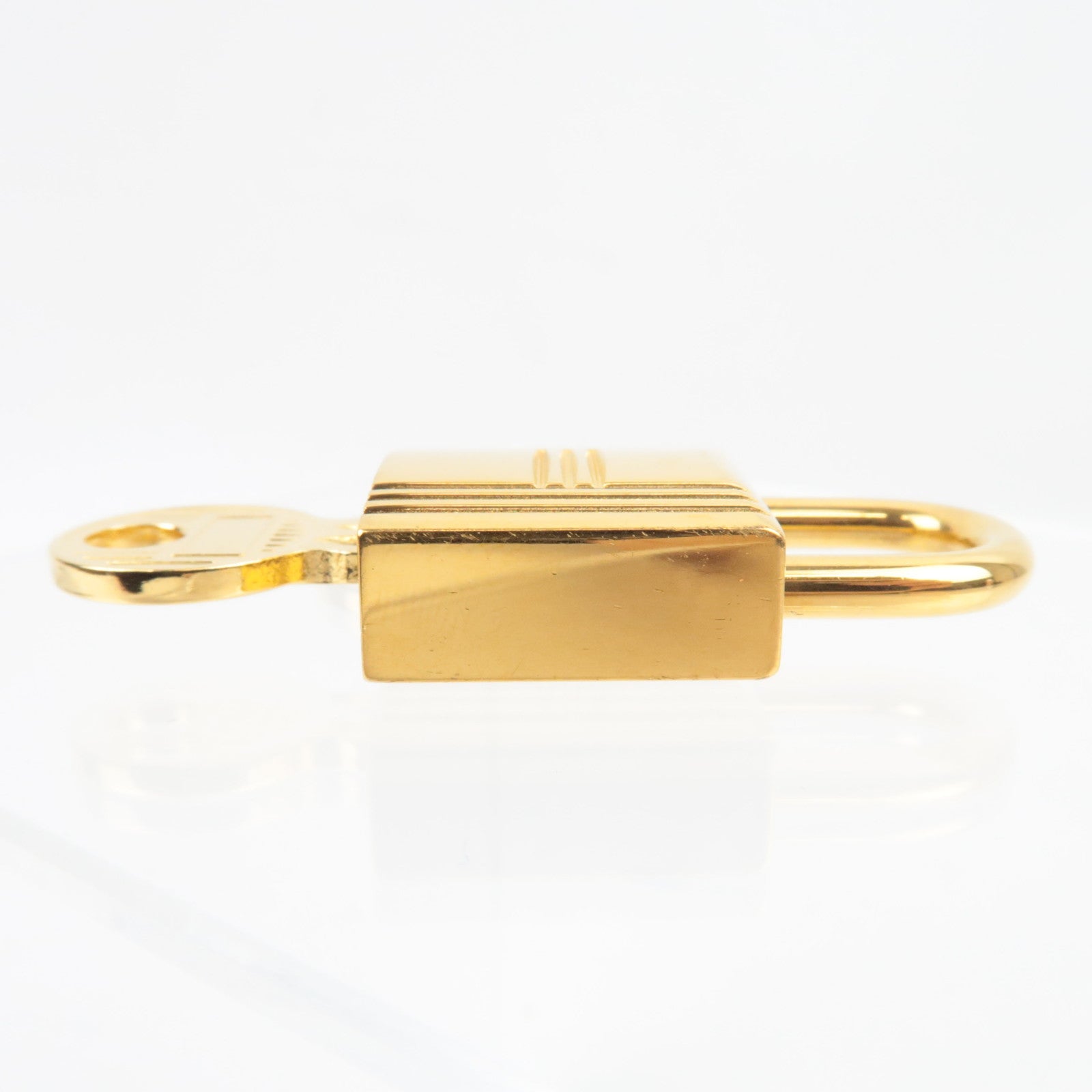 HERMES Key Lock 120 Metal Gold