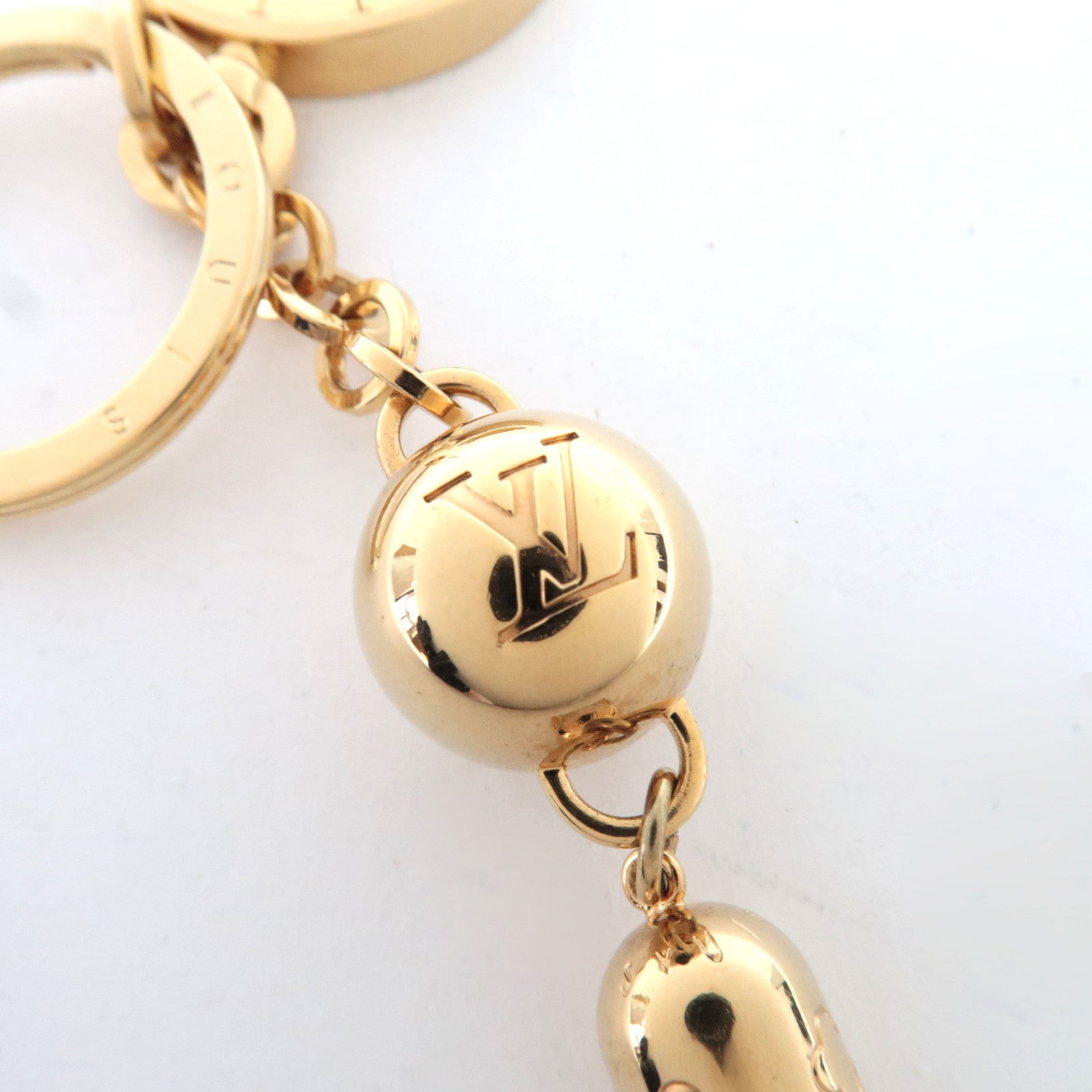 Louis Vuitton Porte Cles Swing Fringe Bag Charm Metal Gold M65215 CX0114