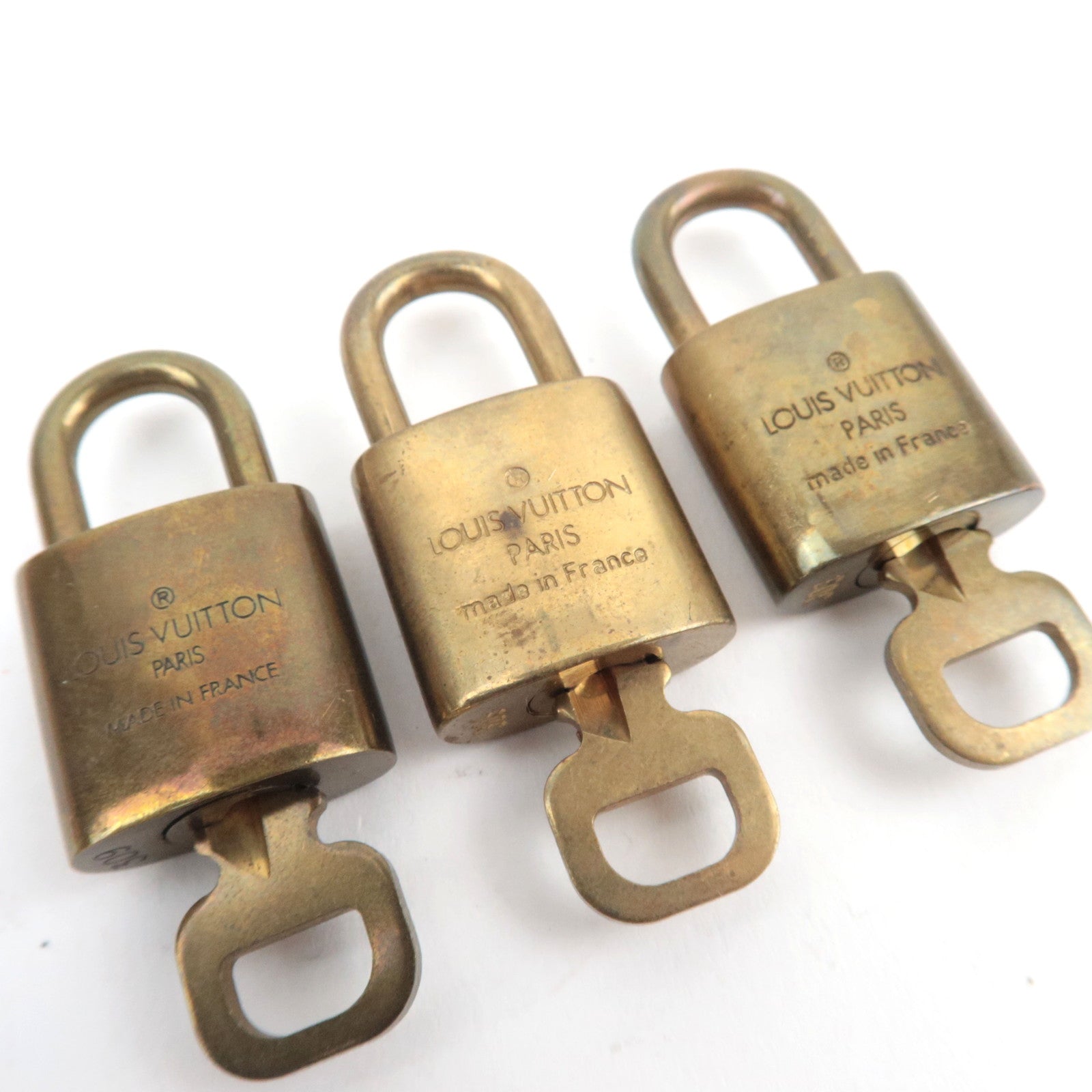 Louis Vuitton Set of 10 Key Locks Cadena Set Metal Gold Color