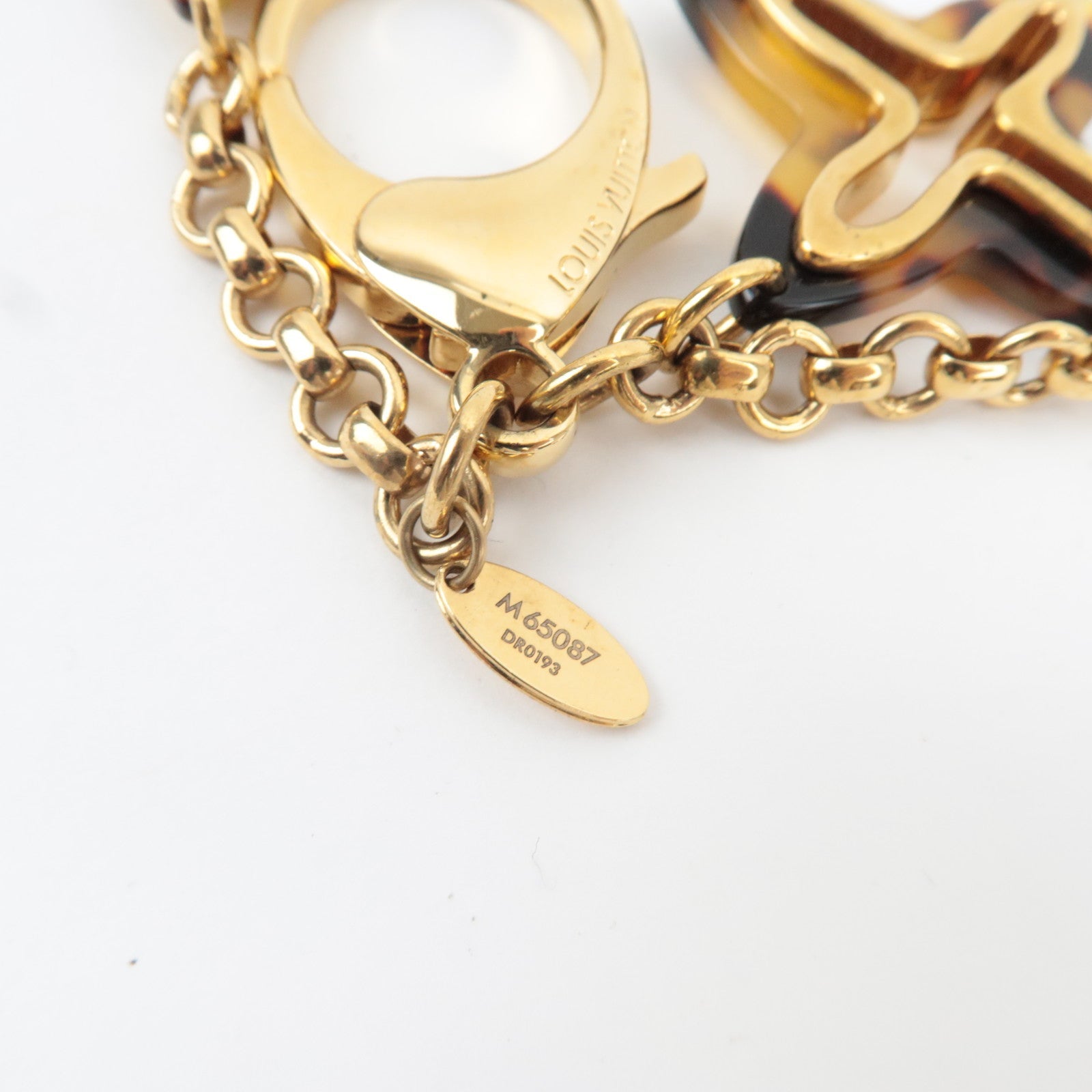 Louis Vuitton Bijoux Sac Insolence Bag Charm Metal Gold Brown M65087 DR0193