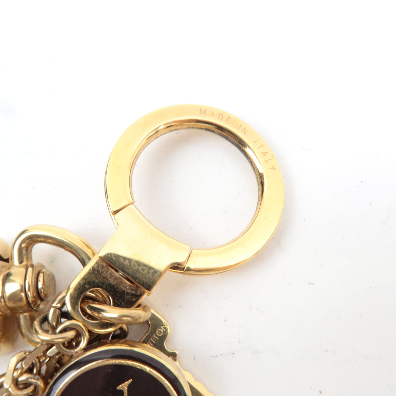 Louis Vuitton Porte Cles Pampille Metal Bag Charm Gold Brown M91929