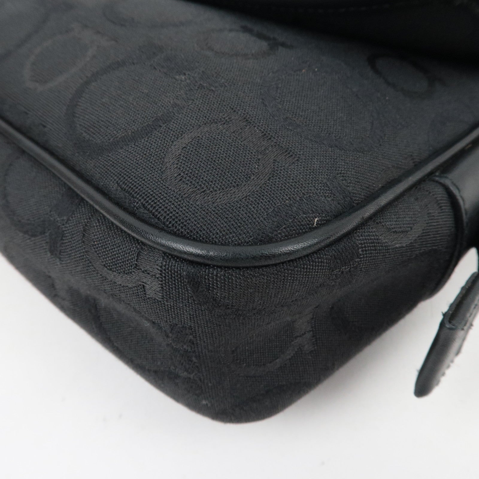 Ferragamo Gancini Shoulder Bag Canvas Leather Black close-up of fabric texture and edges.