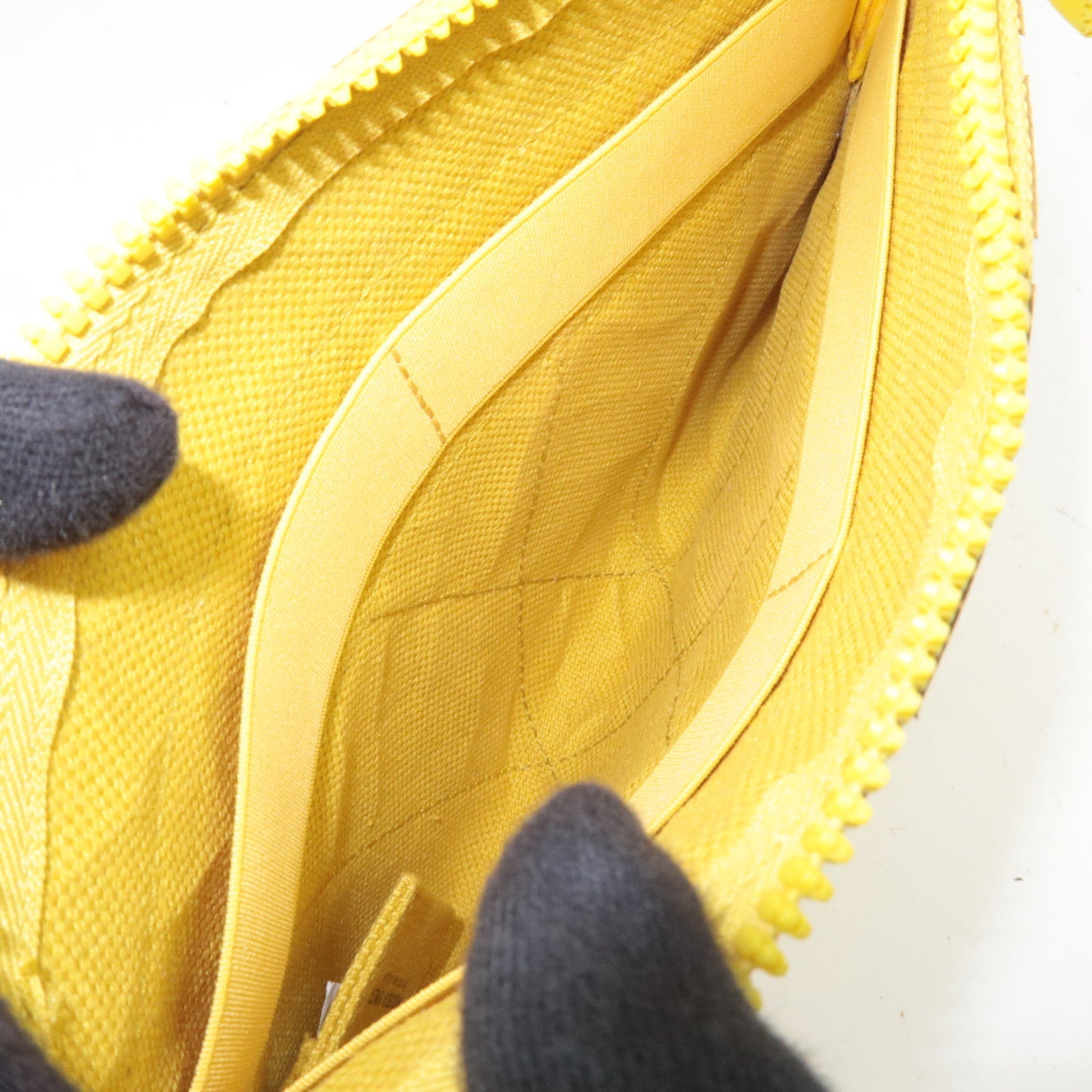 BOTTEGA VENETA Intrecciato Flat Clutch Rubber Canvas Yellow