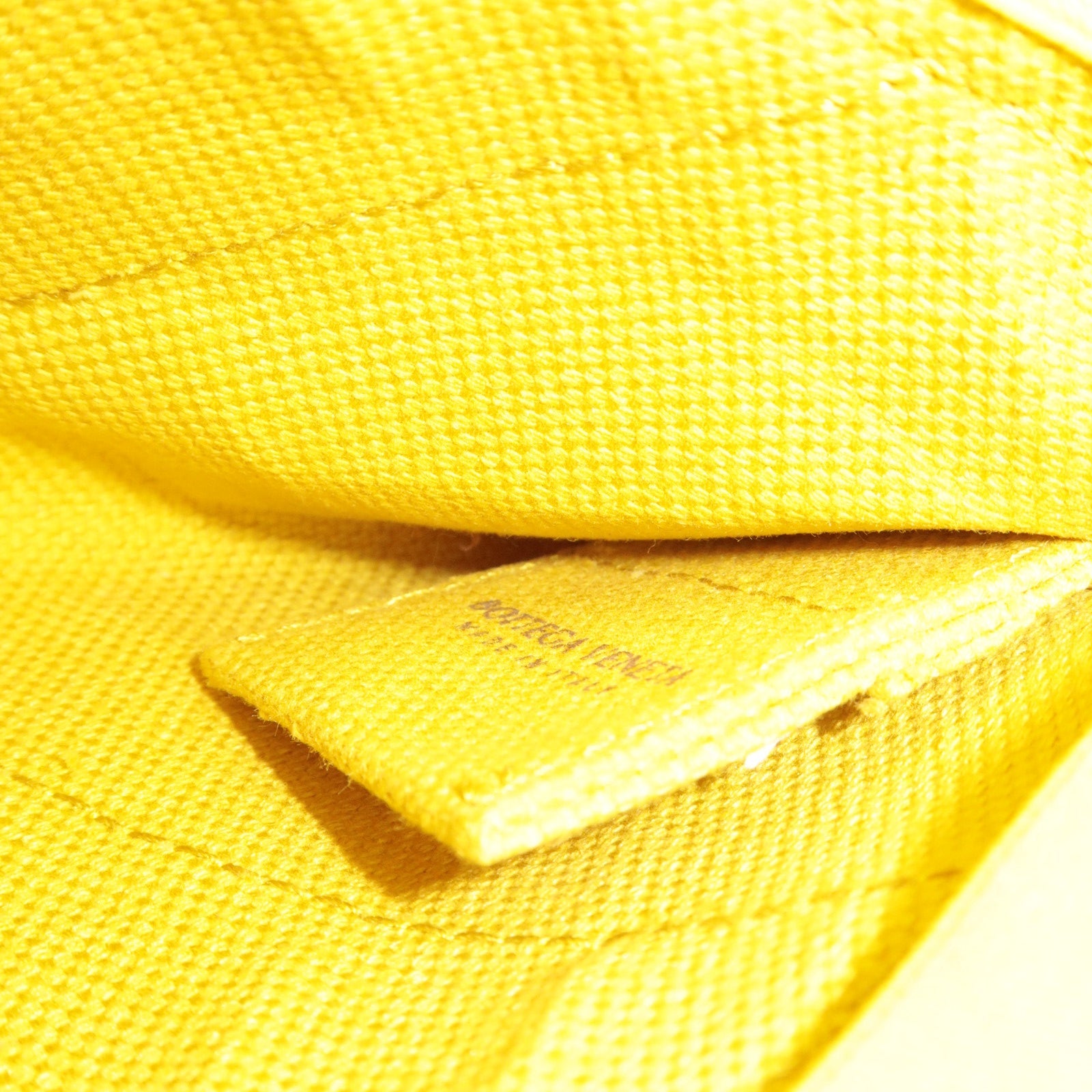 BOTTEGA VENETA Intrecciato Flat Clutch Rubber Canvas Yellow