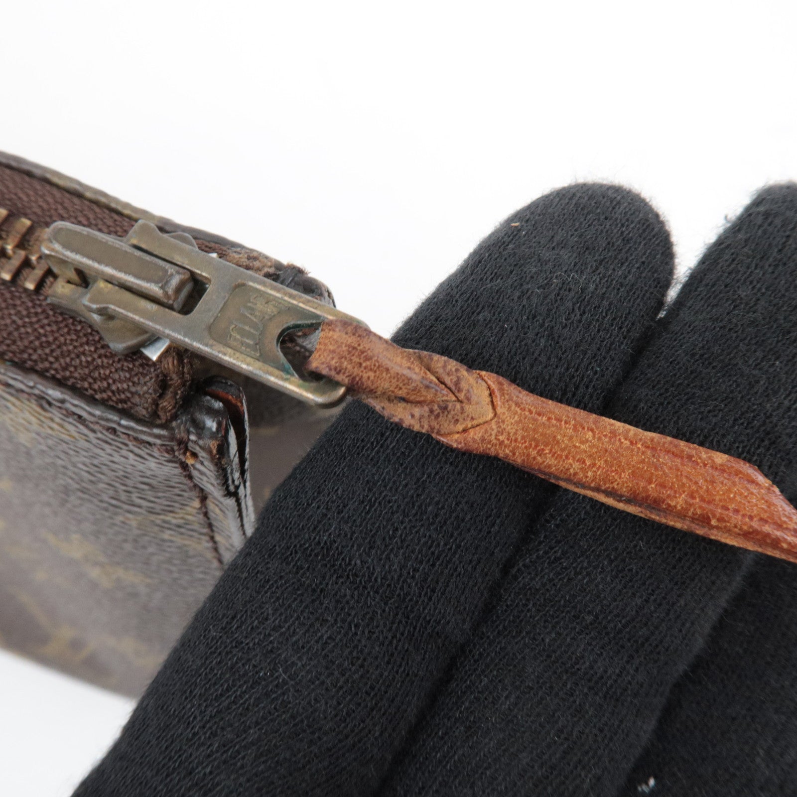 Louis Vuitton Monogram Sac Triangle Handbag M51360