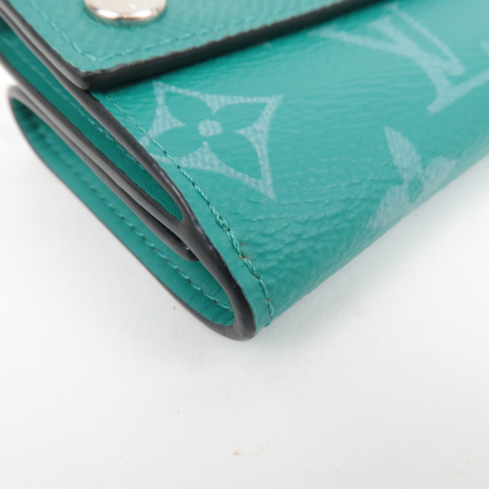 Louis Vuitton Taigarama Discovery Compact Wallet Veil M67626