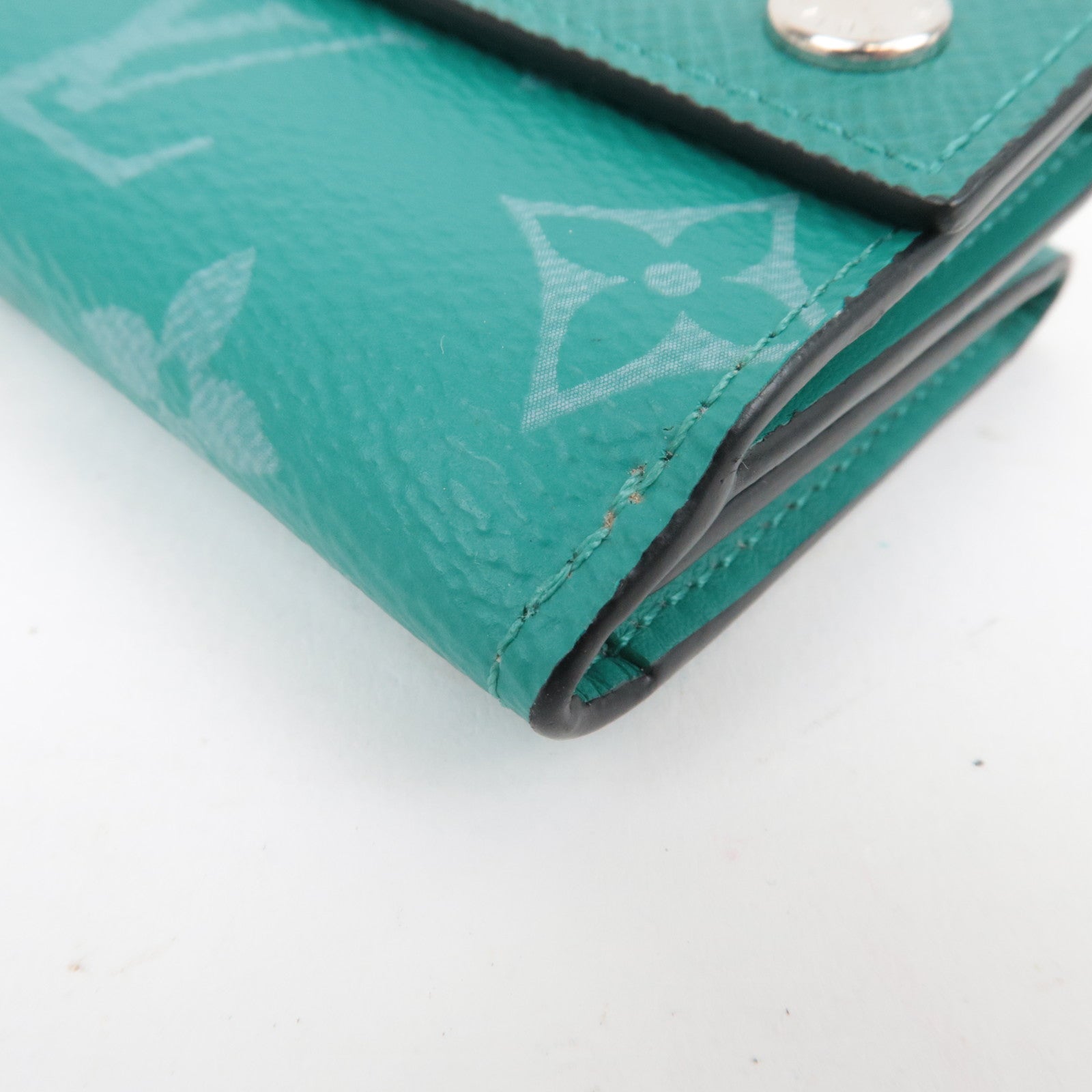 Louis Vuitton Taigarama Discovery Compact Wallet Veil M67626