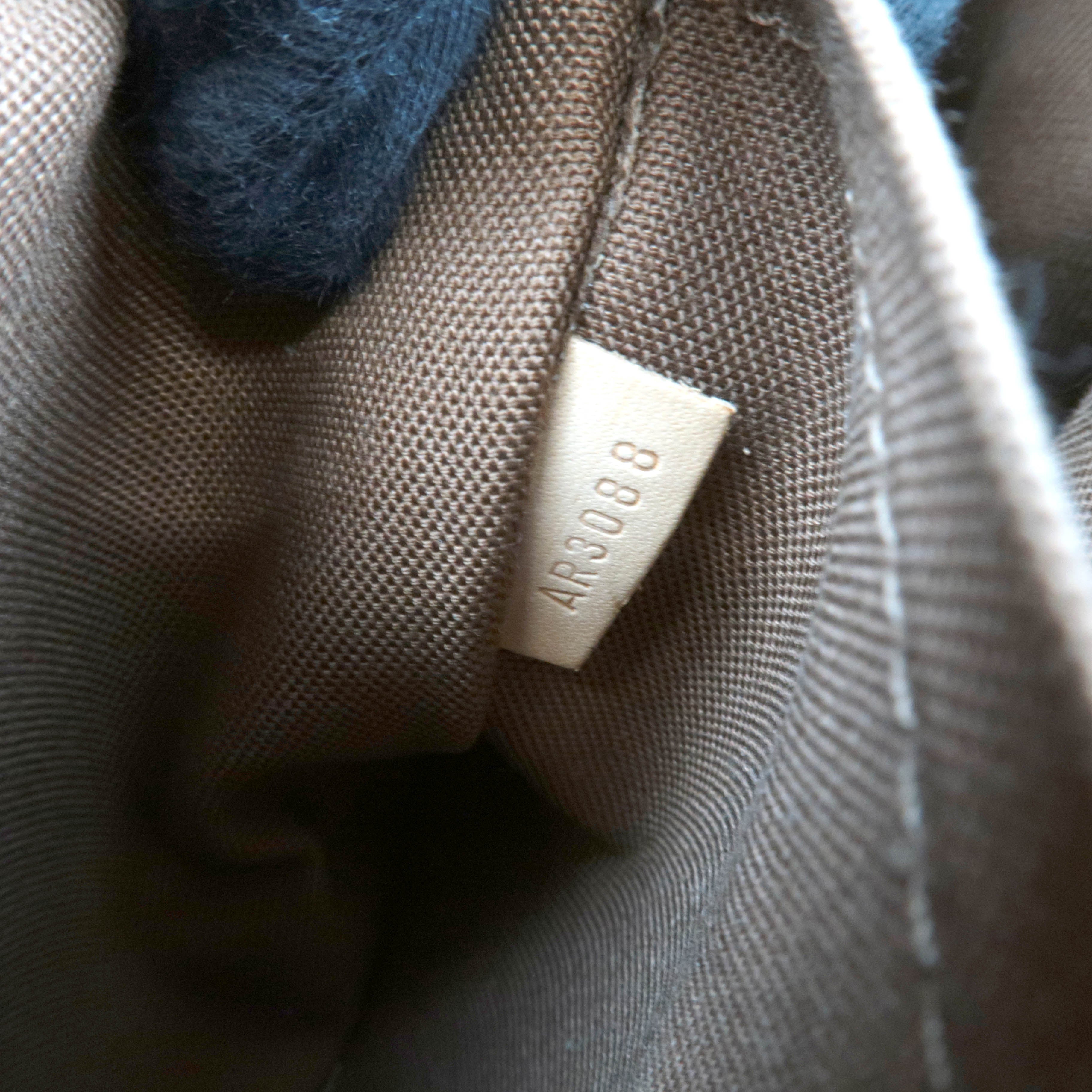 Louis Vuitton Monogram Tivoli PM Handbag M40143