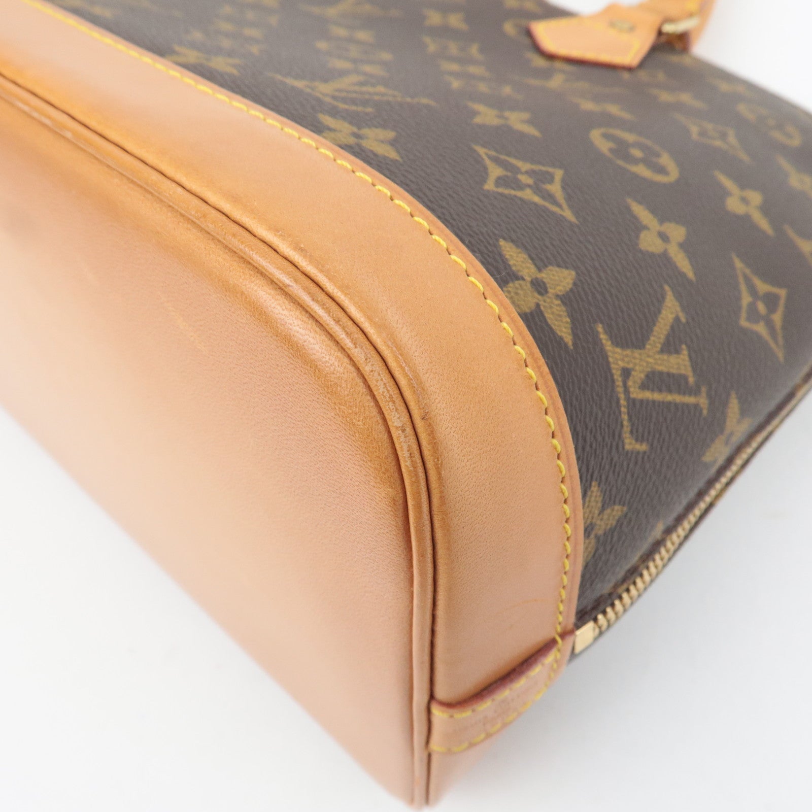 Louis Vuitton Monogram Alma Handbag M51130